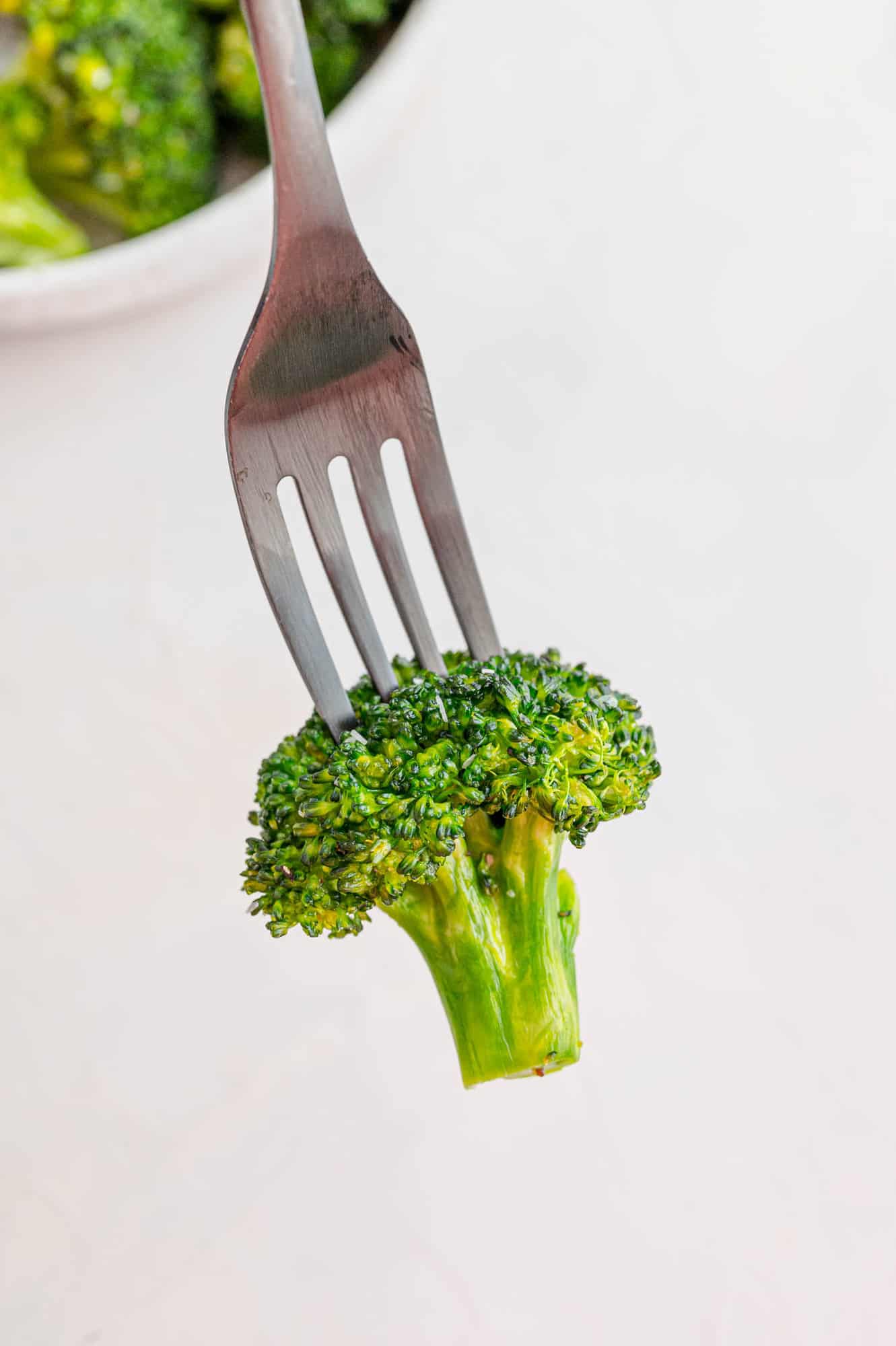 Broccoli on a fork.