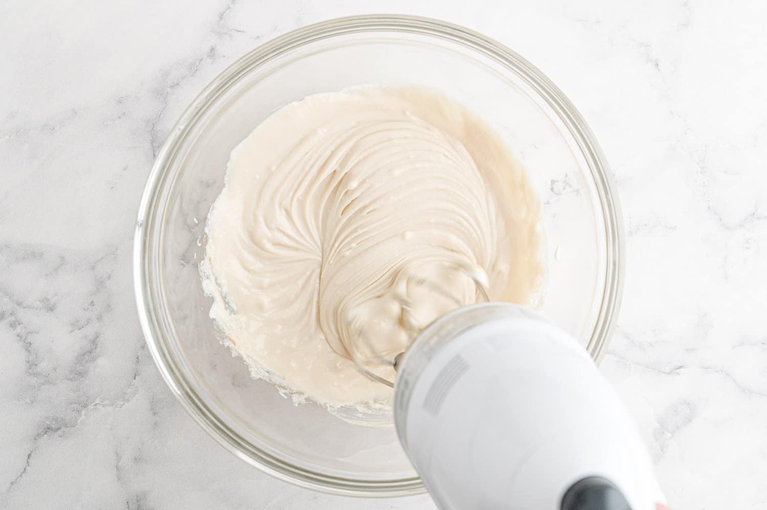 Cream cheese mixture and an electric mixer.