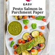 Salmon, text overlay reads "easy pesto salmon in parchment paper."