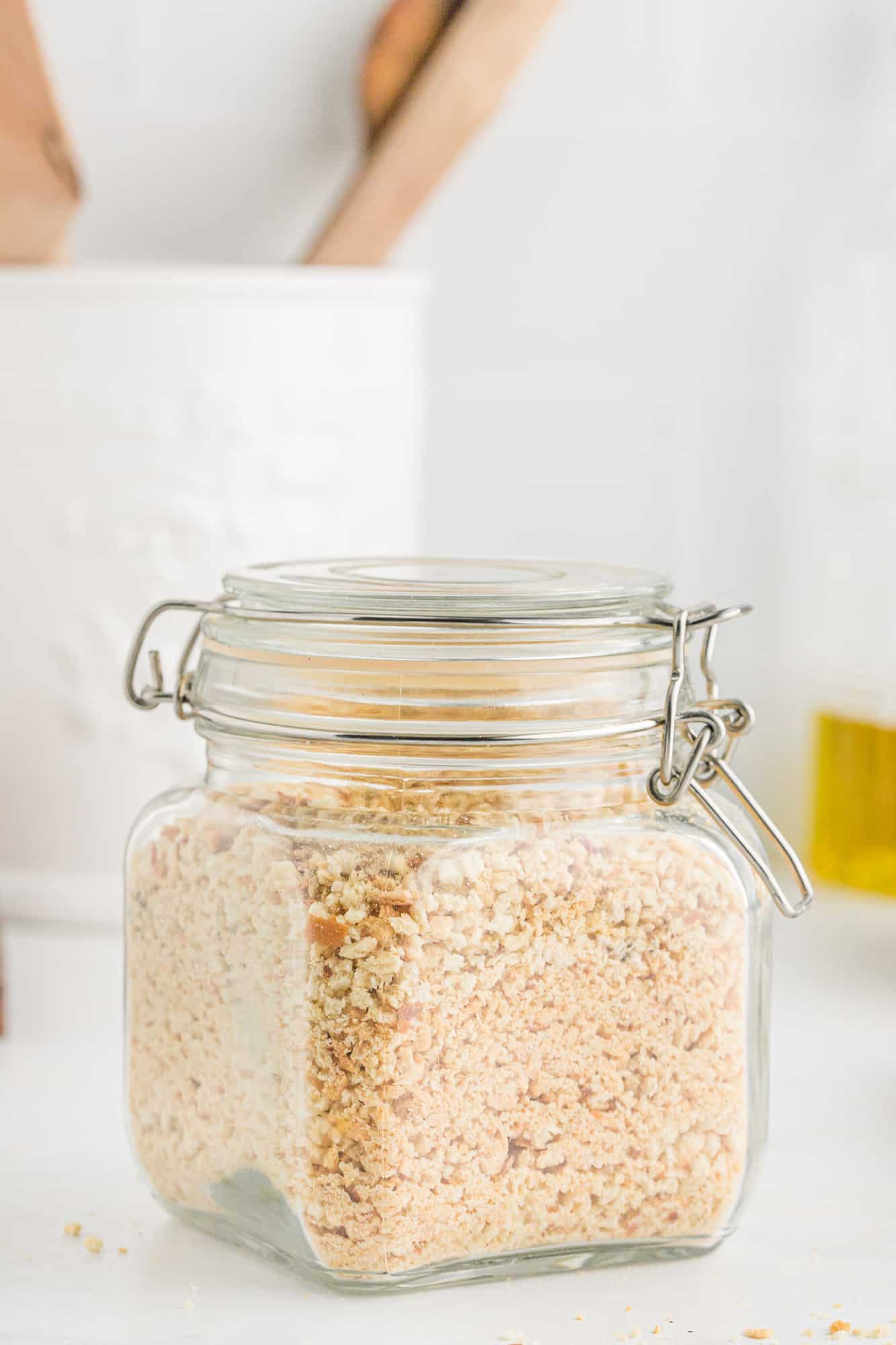 Bread crumbs in a small glass jar.