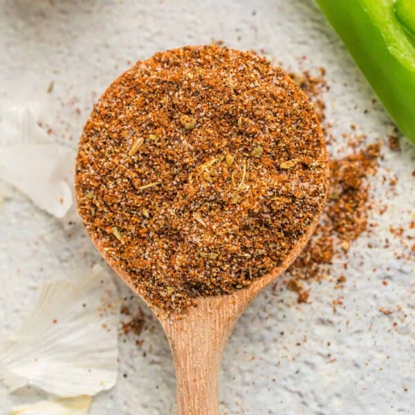 Fajita seasoning on a wooden spoon.