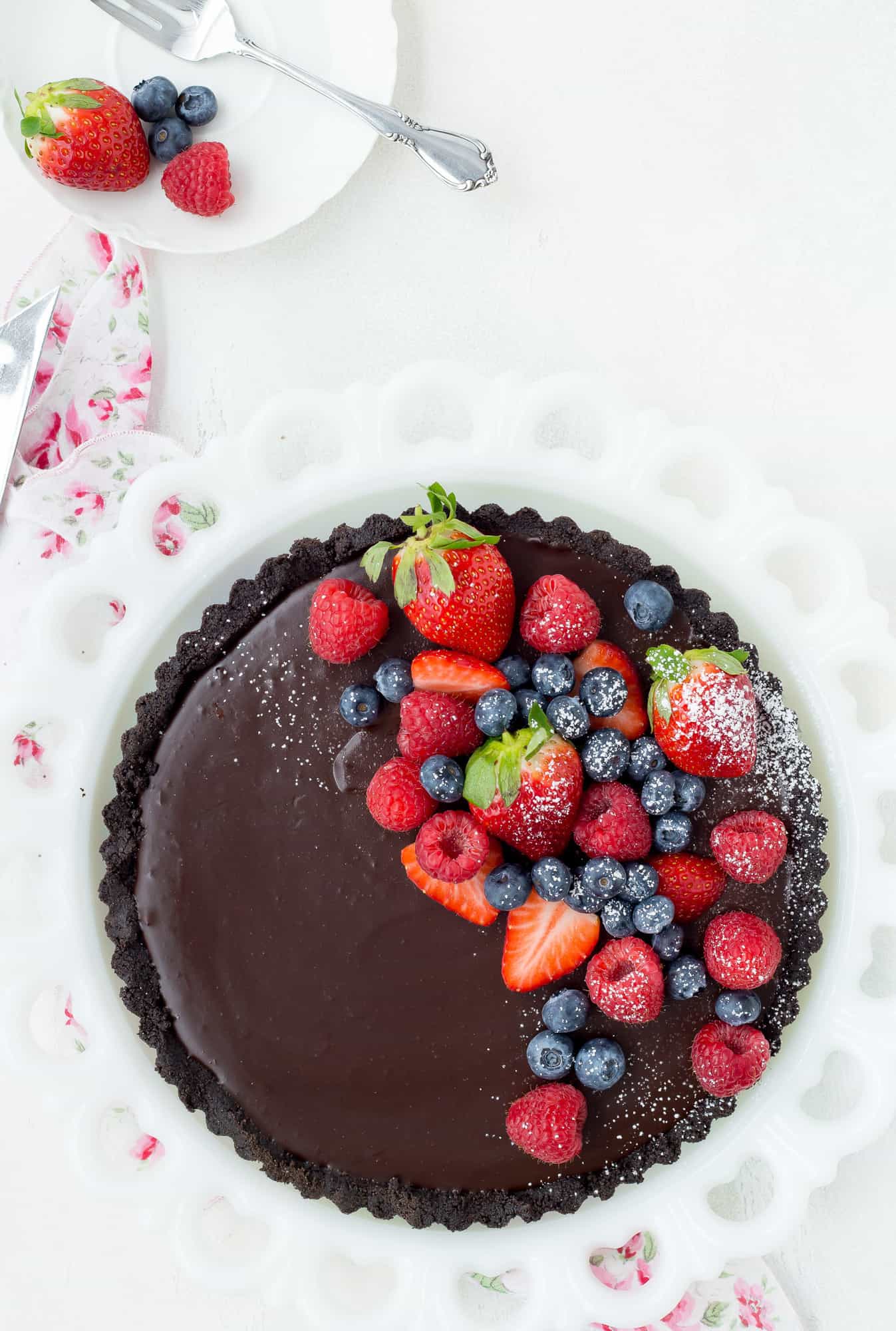 Overhead view of tart with fresh berries.