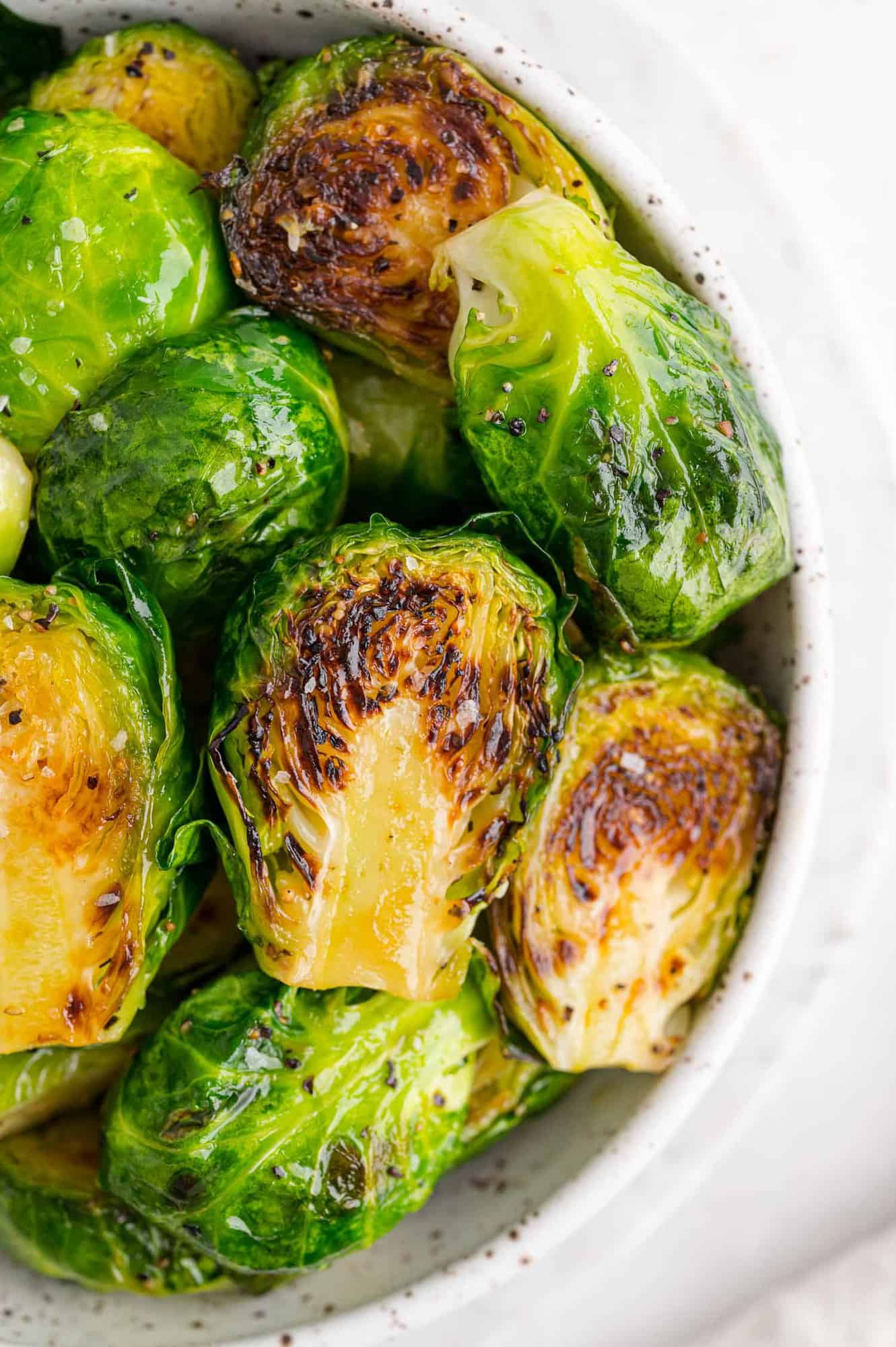 Cooked Brussels sprouts in a bowl.
