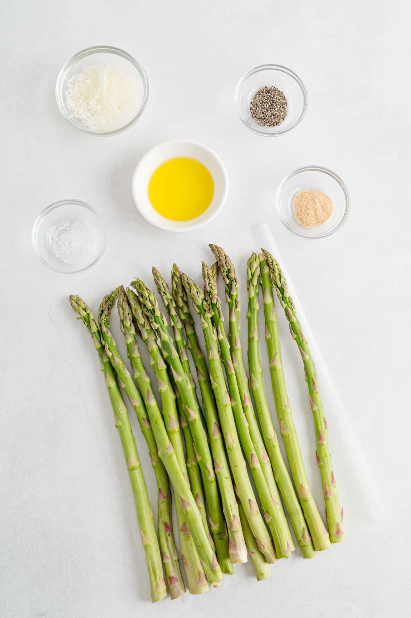 Ingredients needed for recipe including fresh asparagus.