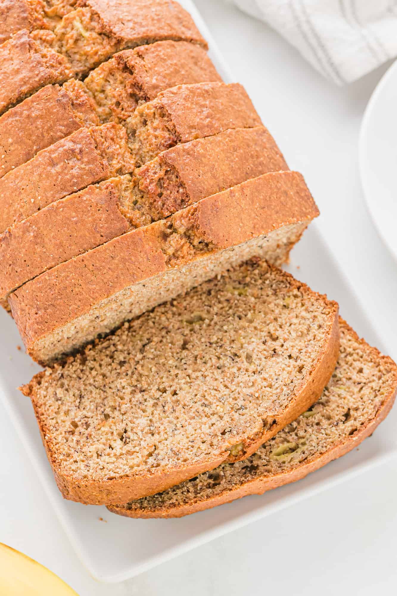 Overhead view of sliced banana bread.