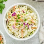 Healthy coleslaw in a small white bowl.