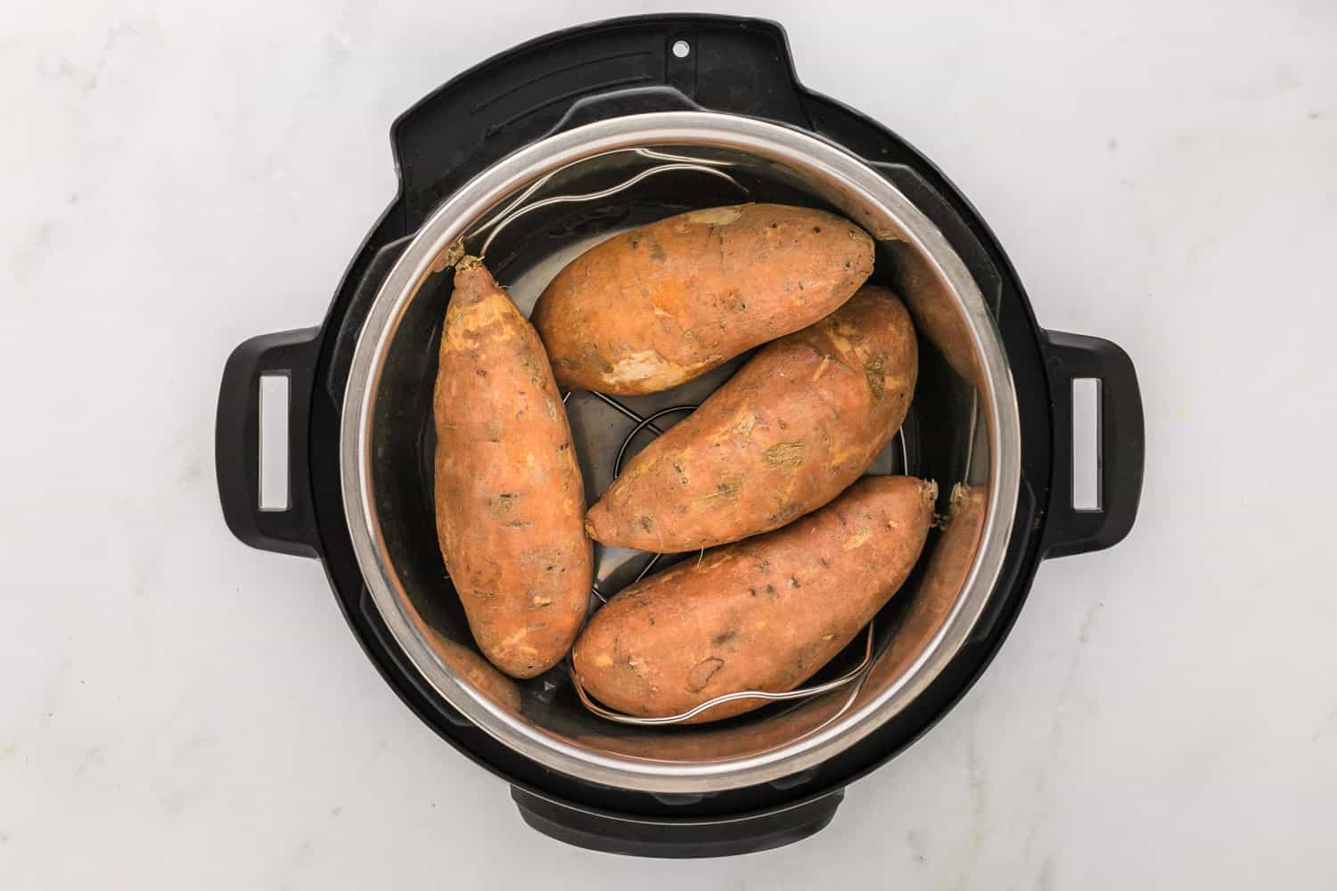 Instant pot sweet potatoes before being cooked.