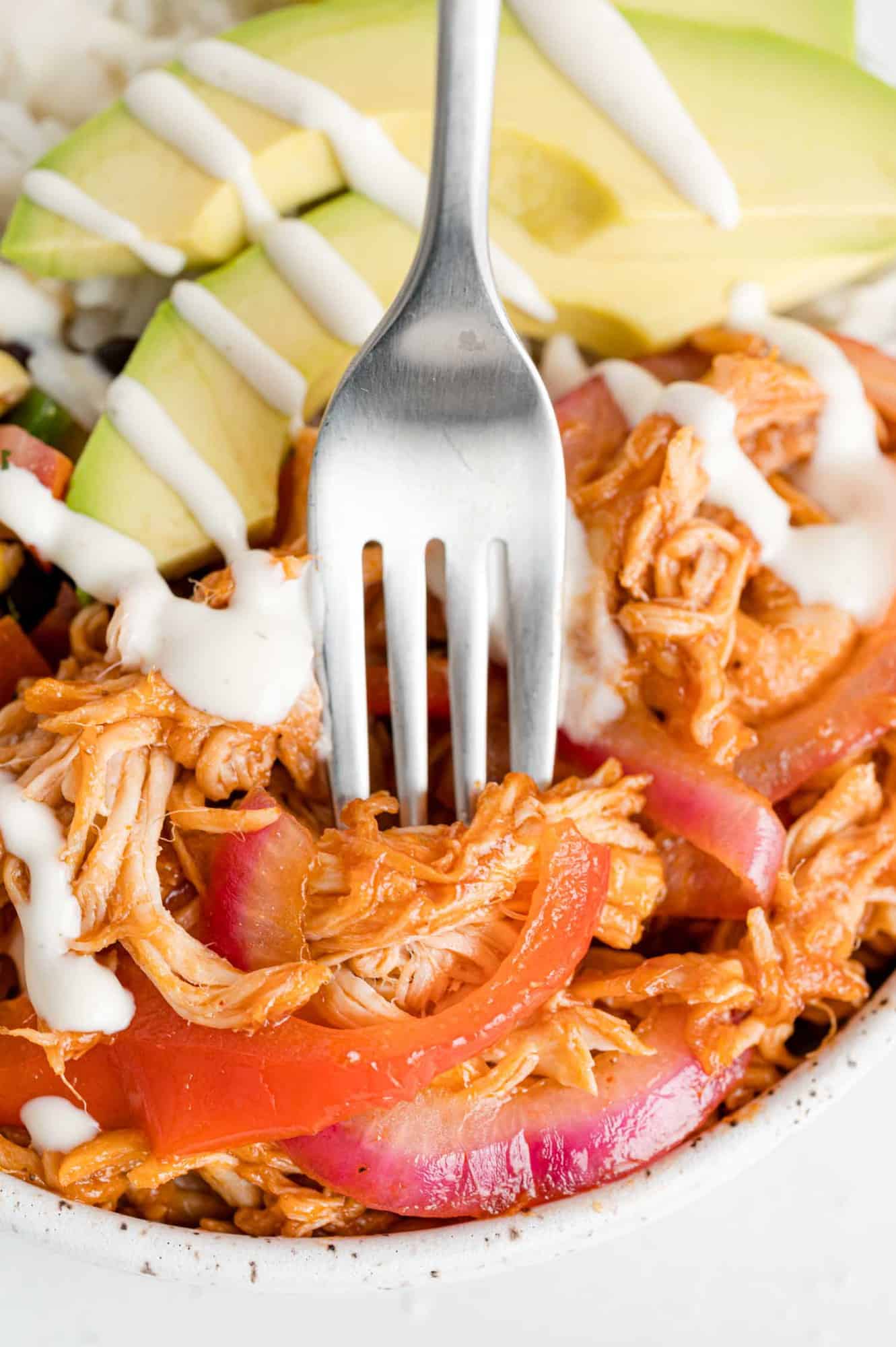 BBQ Chicken and peppers on a fork.