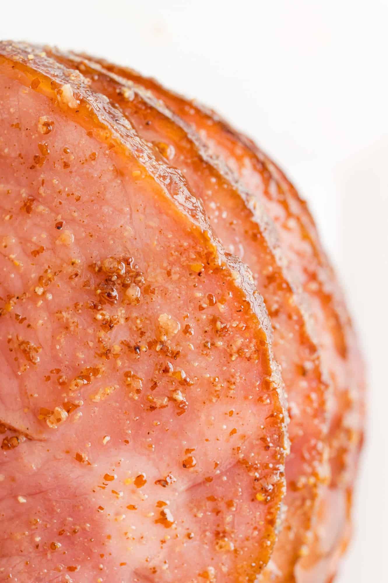 Close up of cooked ham slices.