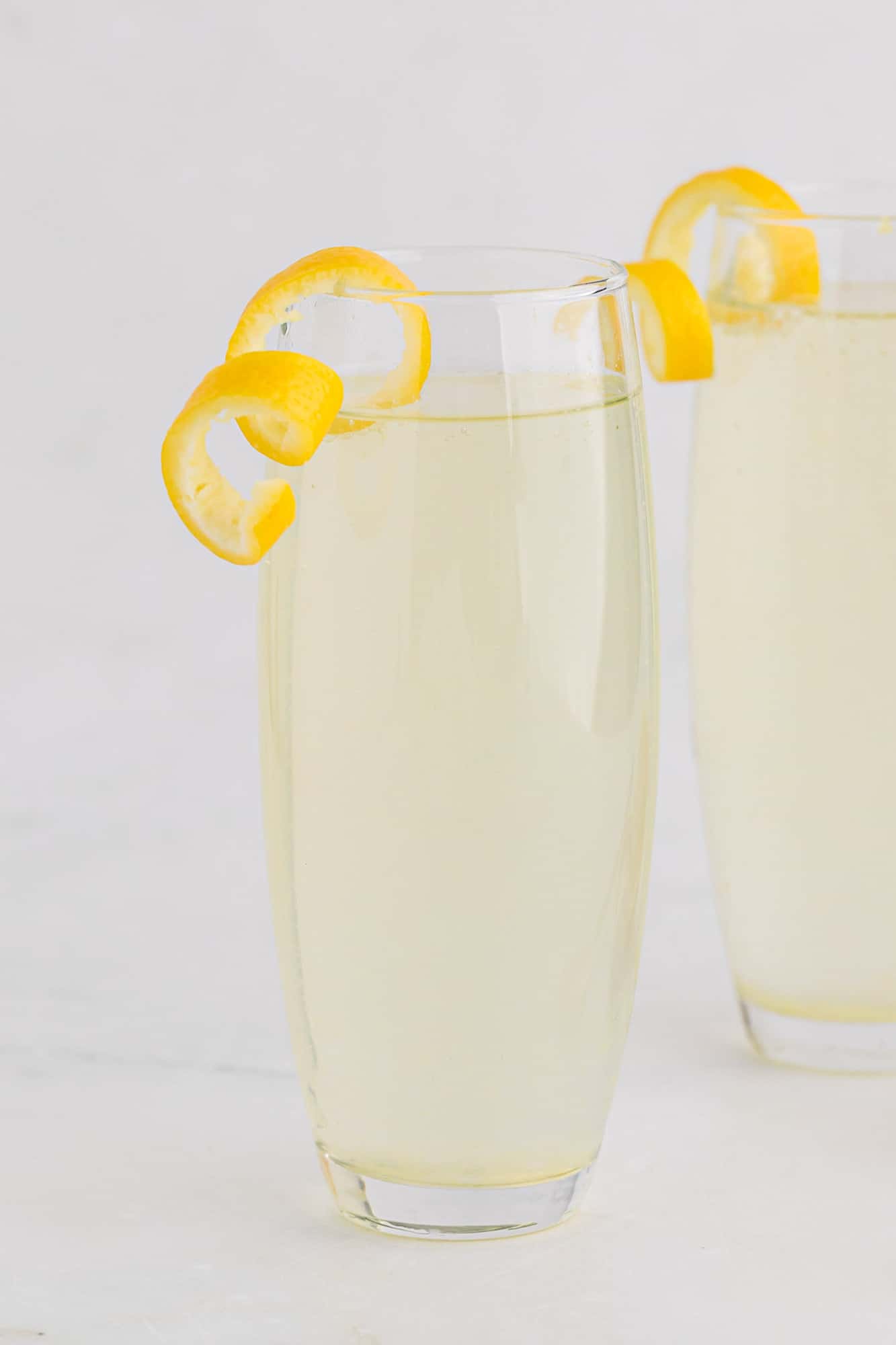 French 75 cocktail with another in the background.