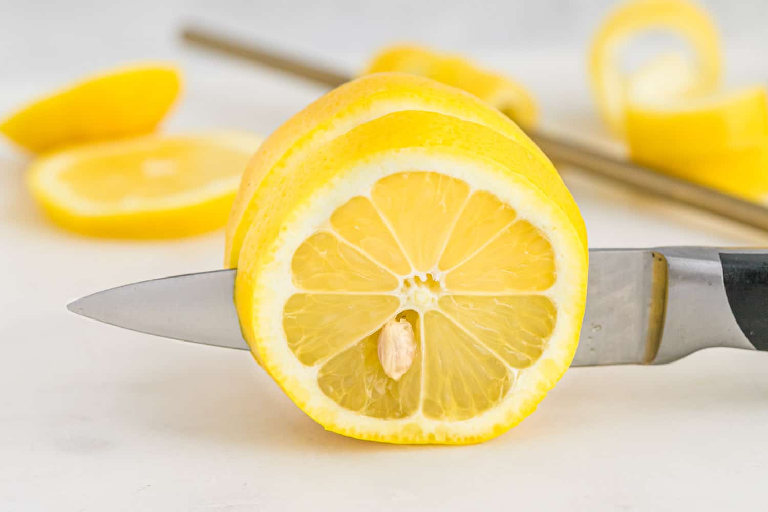 Lemon being sliced.