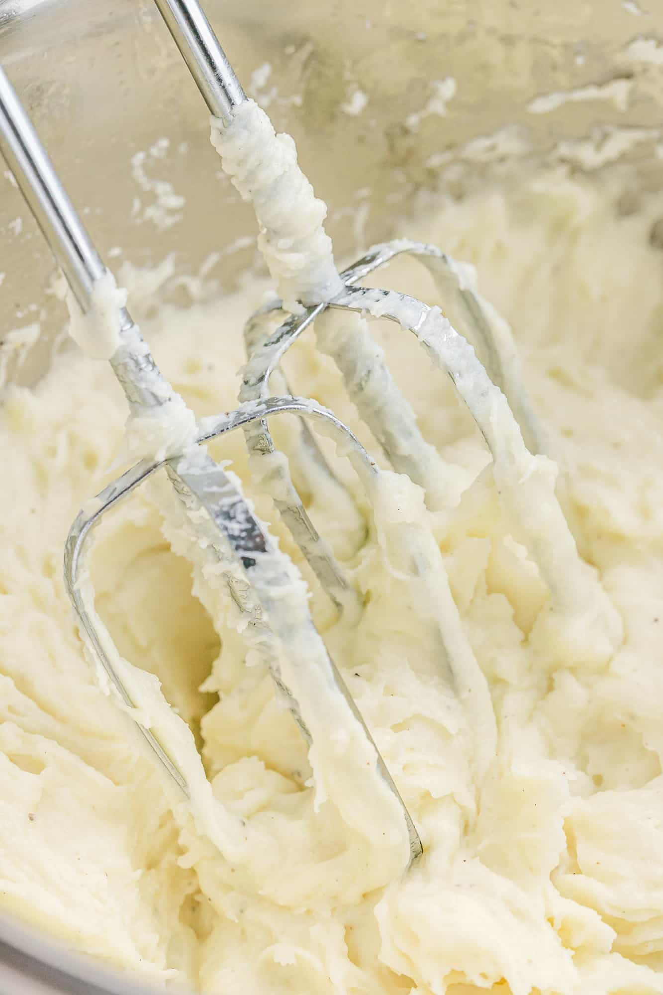 Potatoes mashed with a hand mixer.