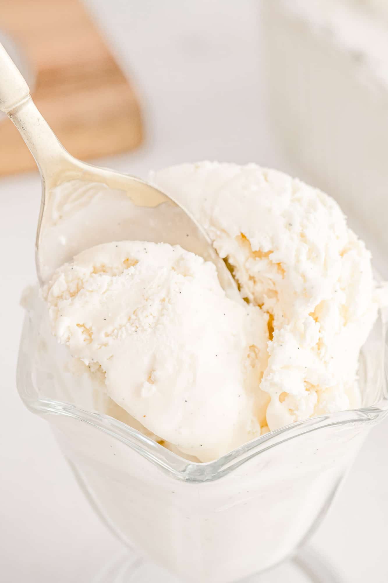 Homemade vanilla ice cream on a spoon.