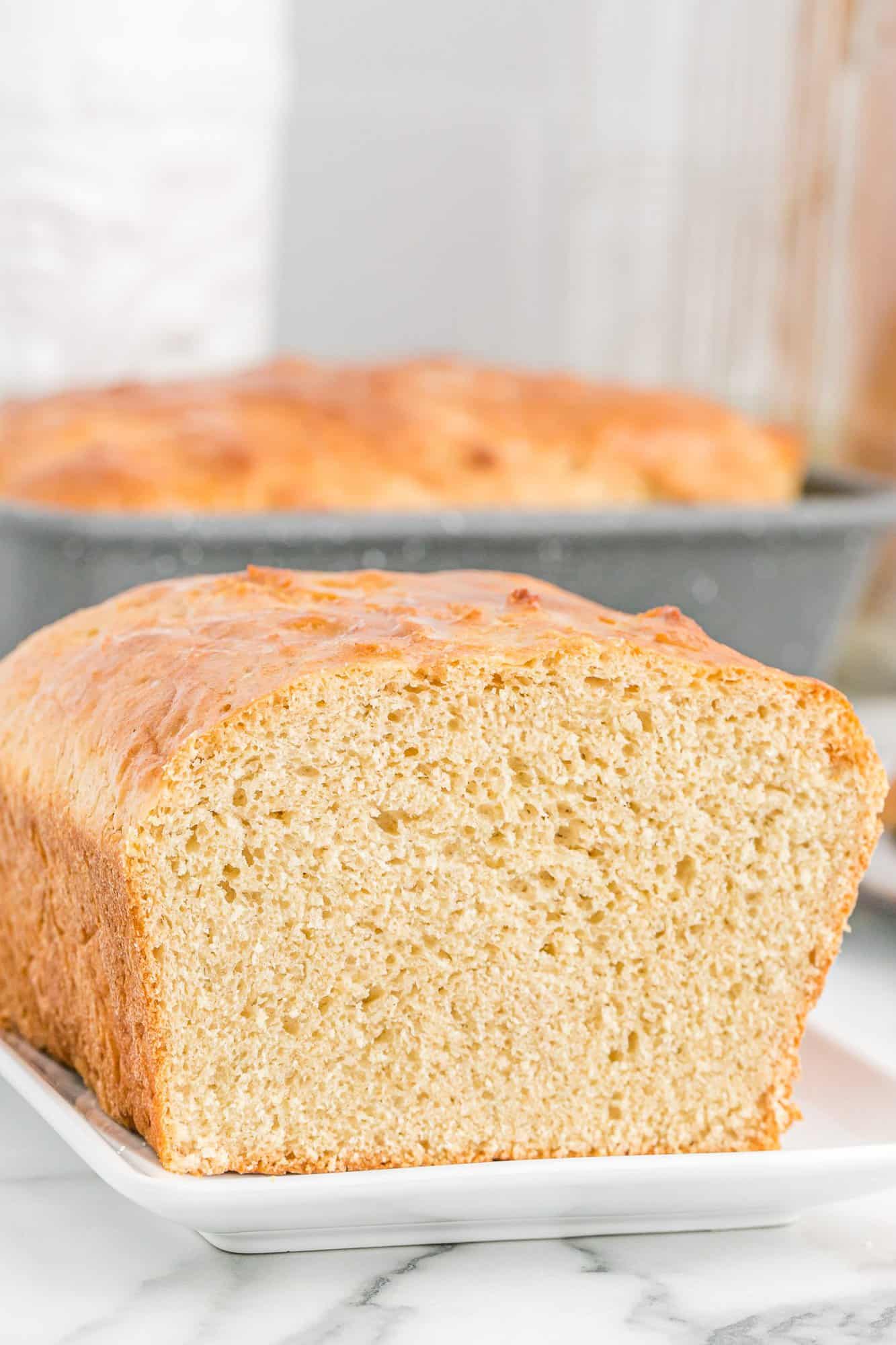 Close up view of loaf of bread with end sliced off.