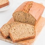 Whole wheat banana bread, partially sliced.