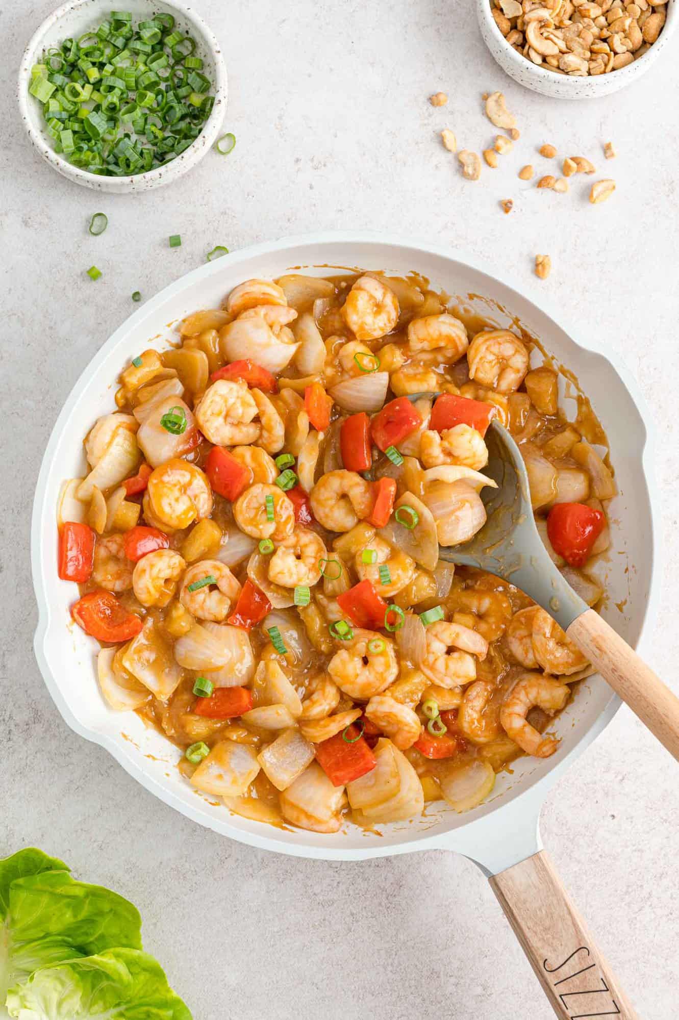 Shrimp lettuce wrap filling in a pan.