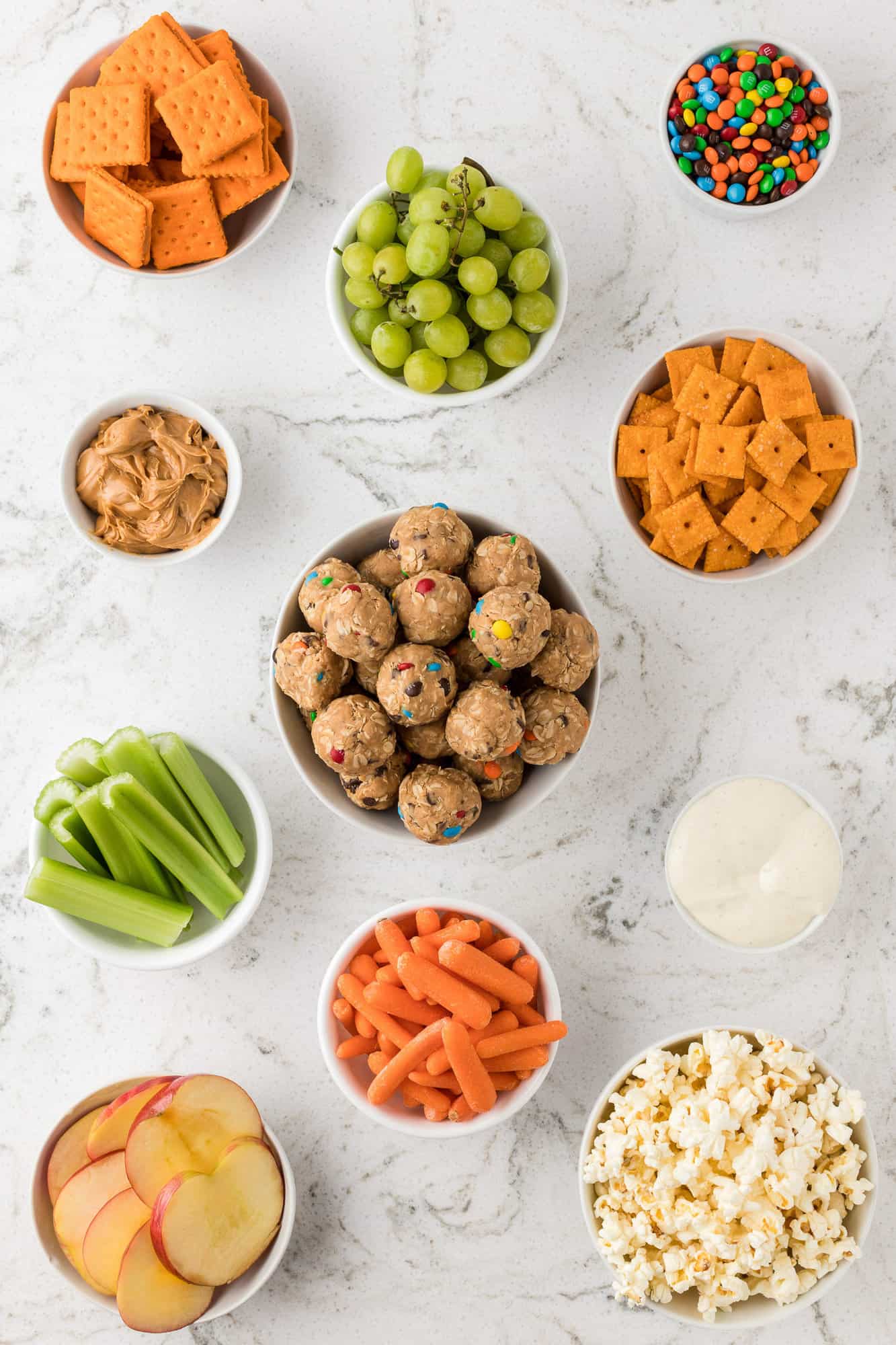 Components of board in separate bowls.