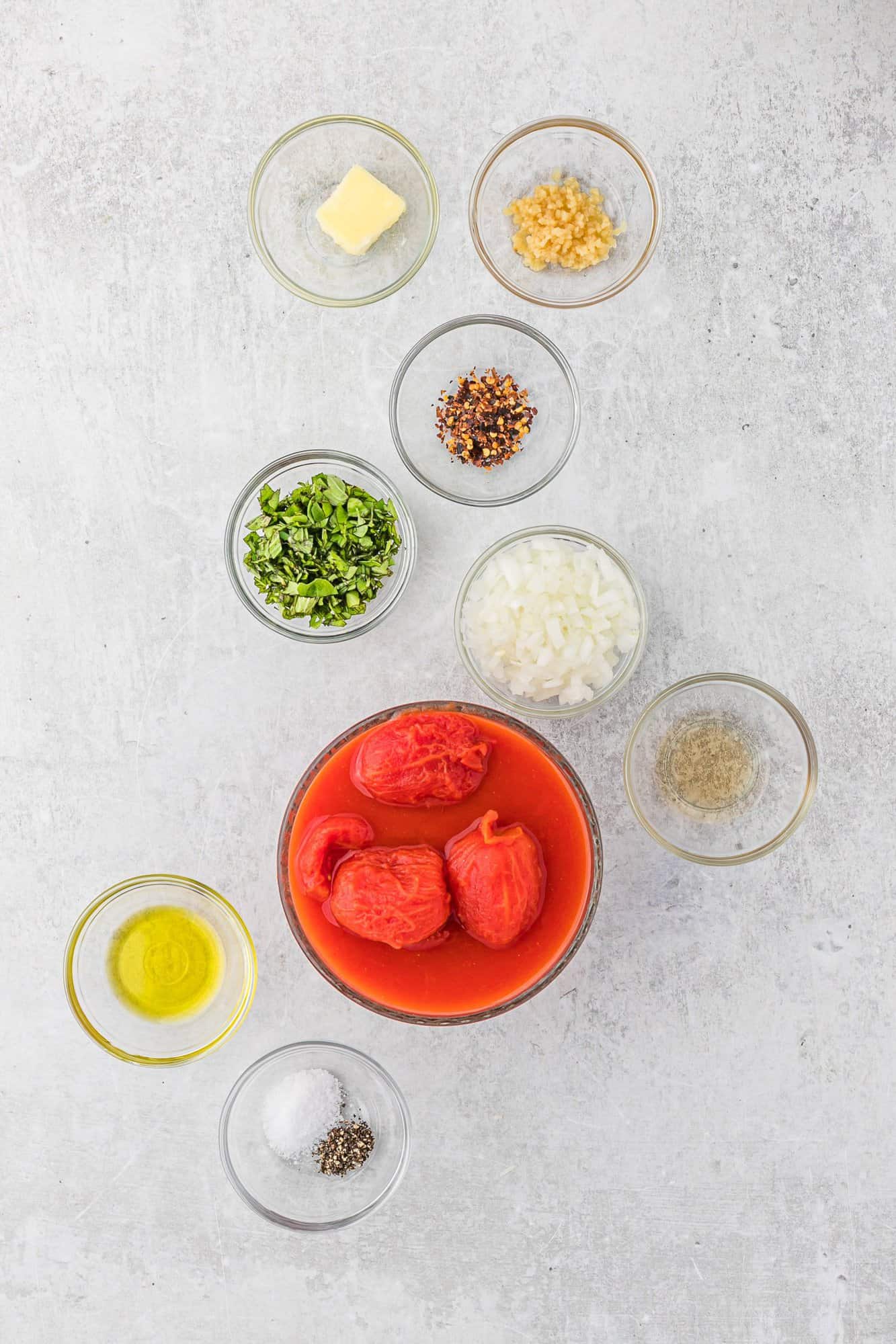 Ingredients needed for recipe including canned tomatoes.