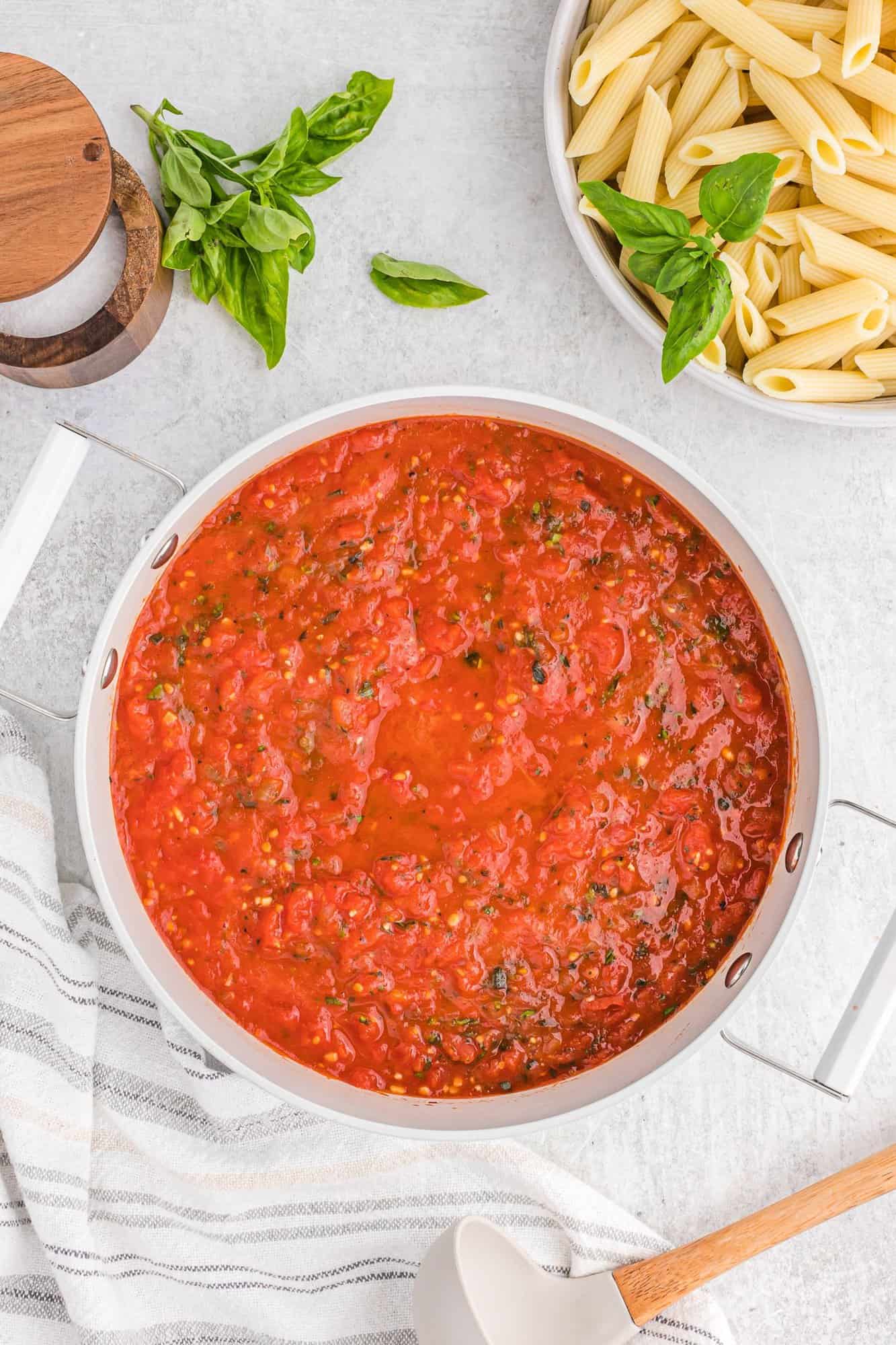 Arrabbiata sauce in a large pan.