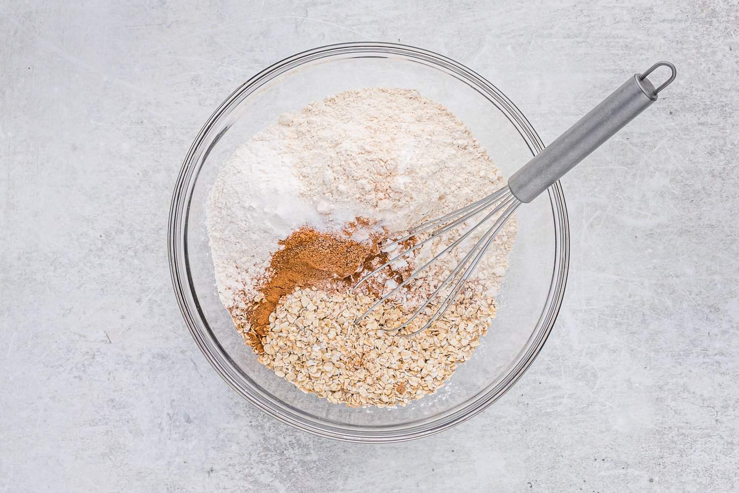 Dry ingredients in a glass bowl.