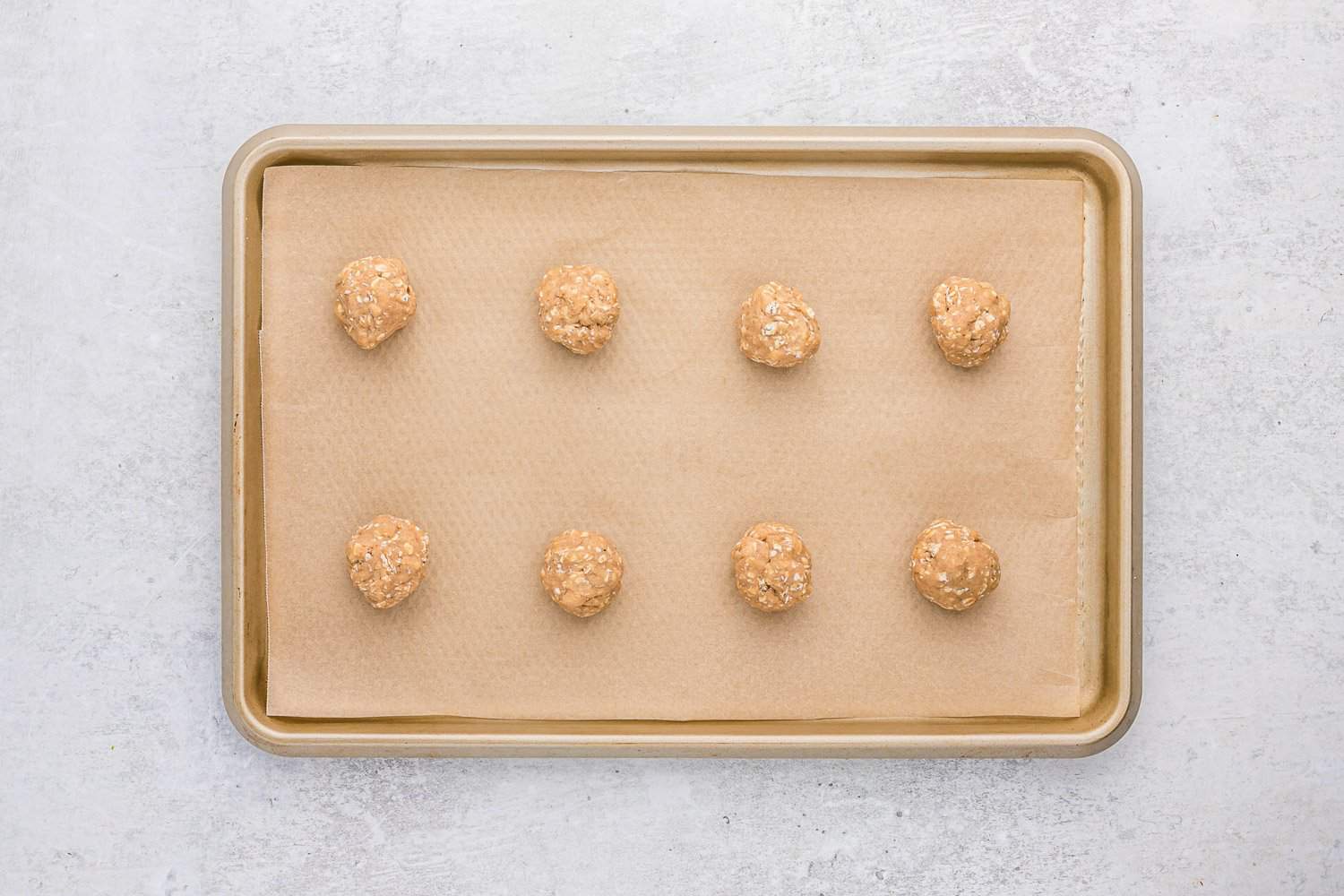 Unbaked cookies on pan.