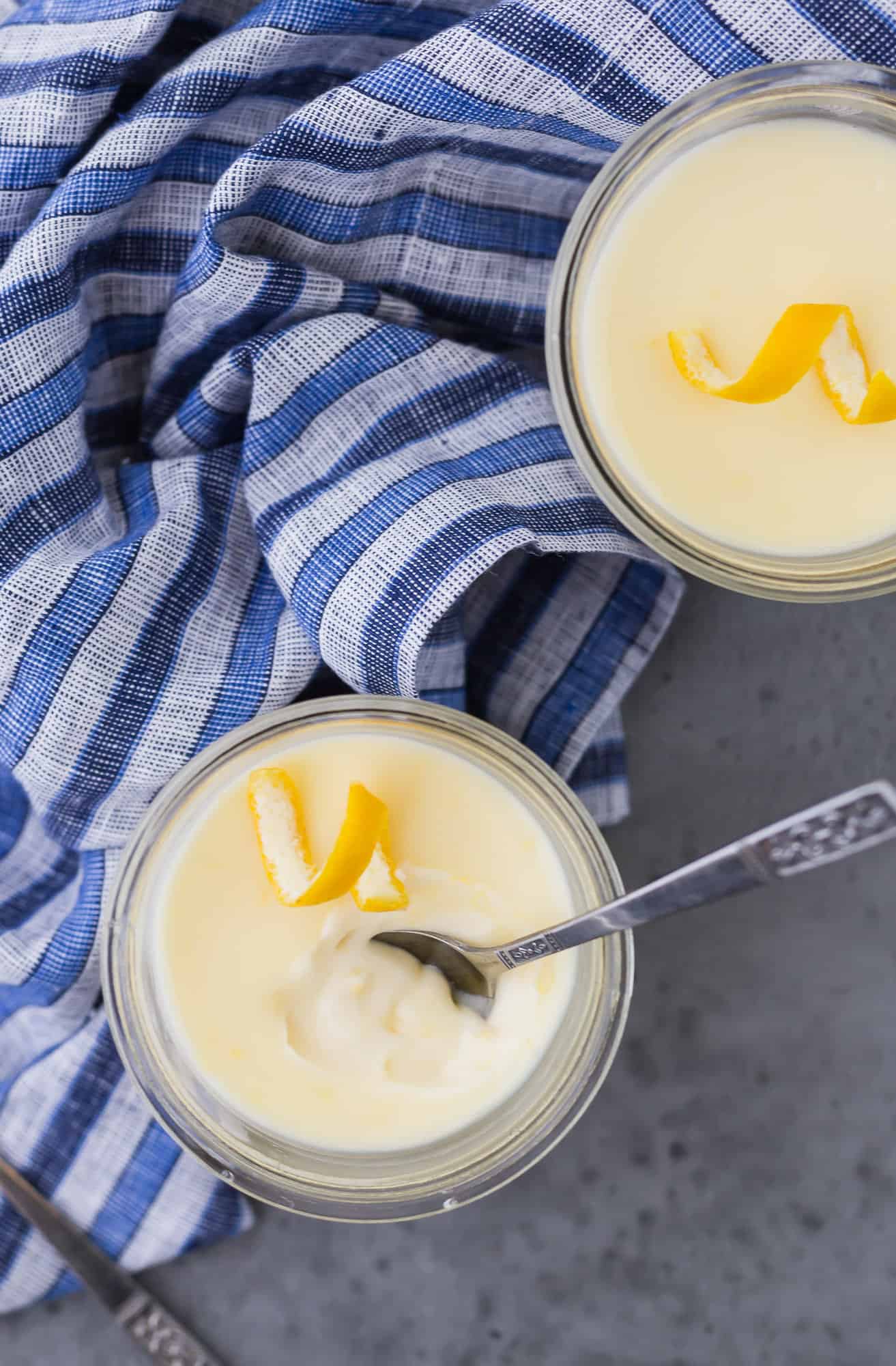 Lemon pudding with a spoon in it.