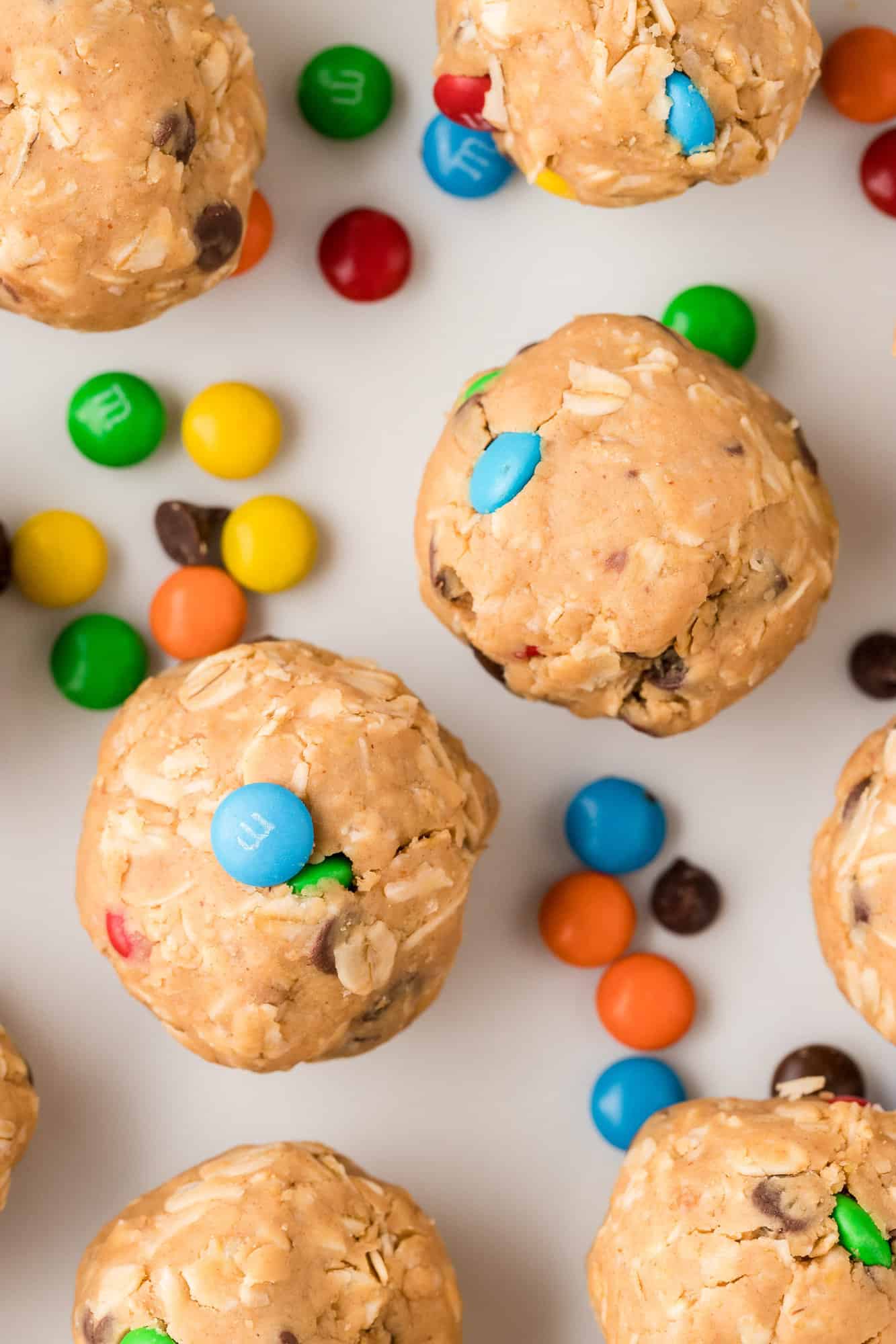 Monster cookie energy bites against a white background.