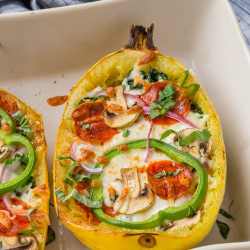 Squash filled with pizza toppings.