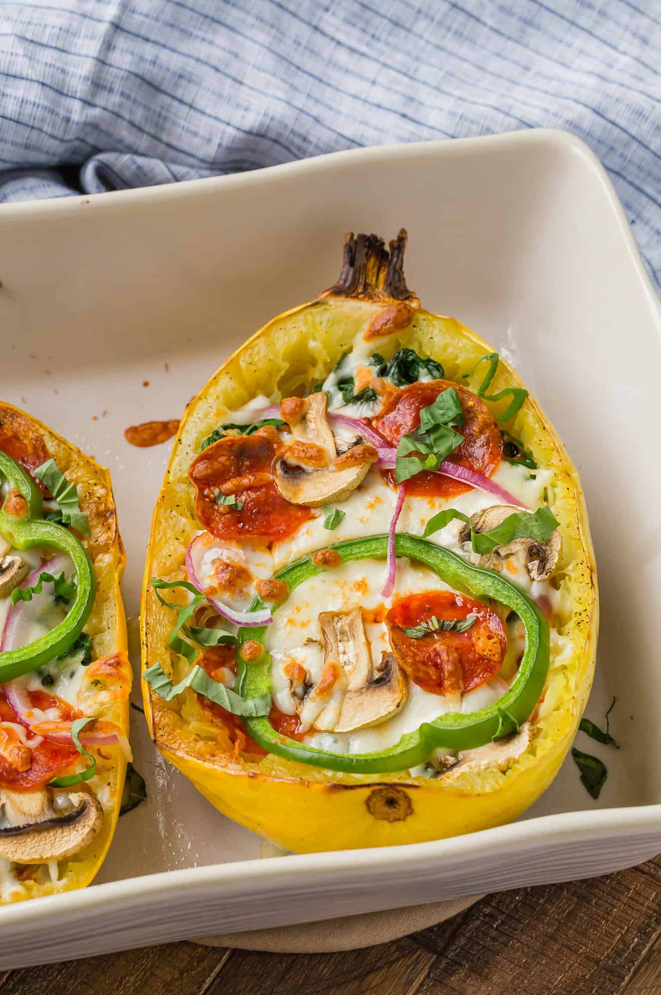 Squash filled with pizza toppings.