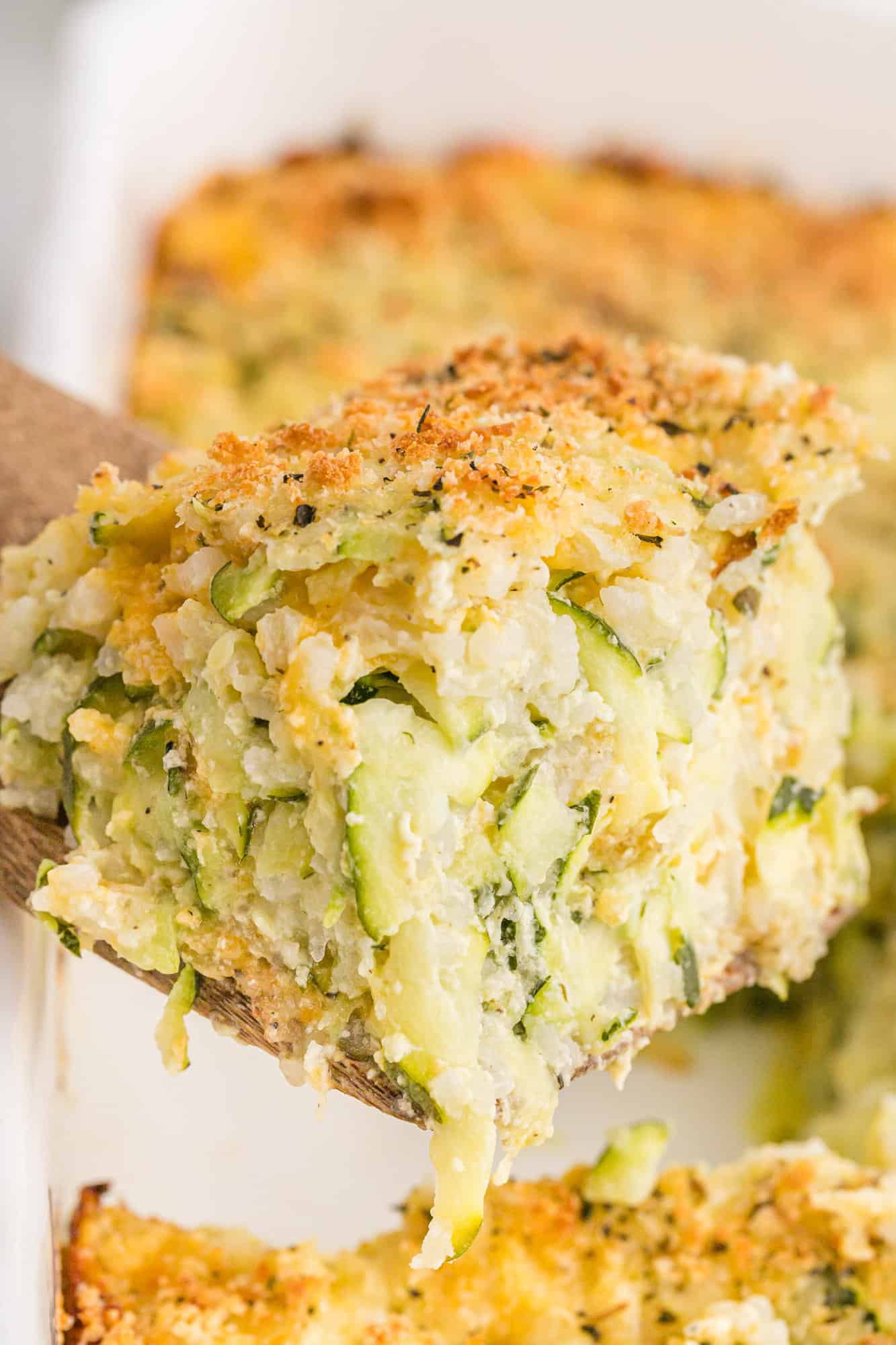 Close up of zucchini rice casserole, showing texture.