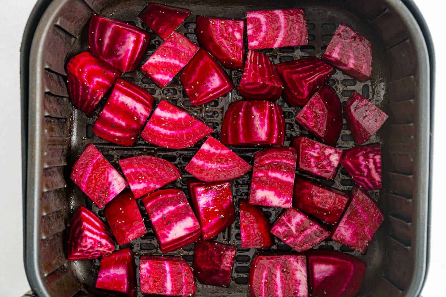 Uncooked beets in the air fryer.