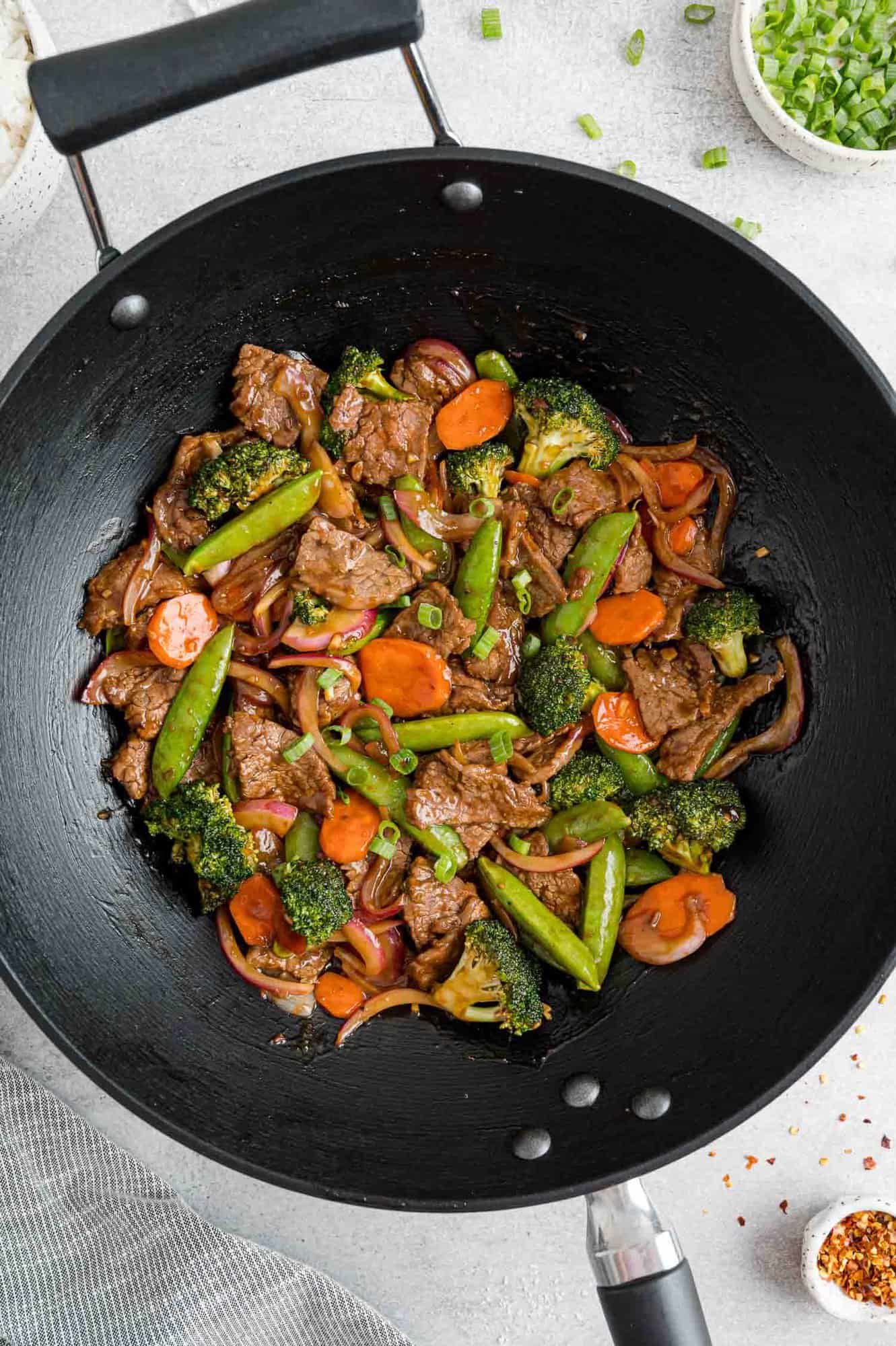 Stir fry in black wok.