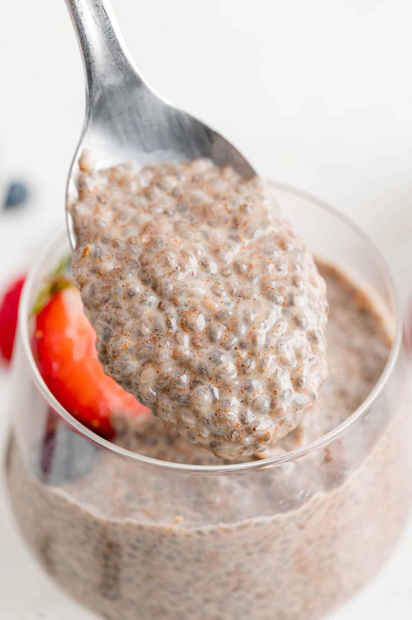 Close up of chia pudding on a spoon.