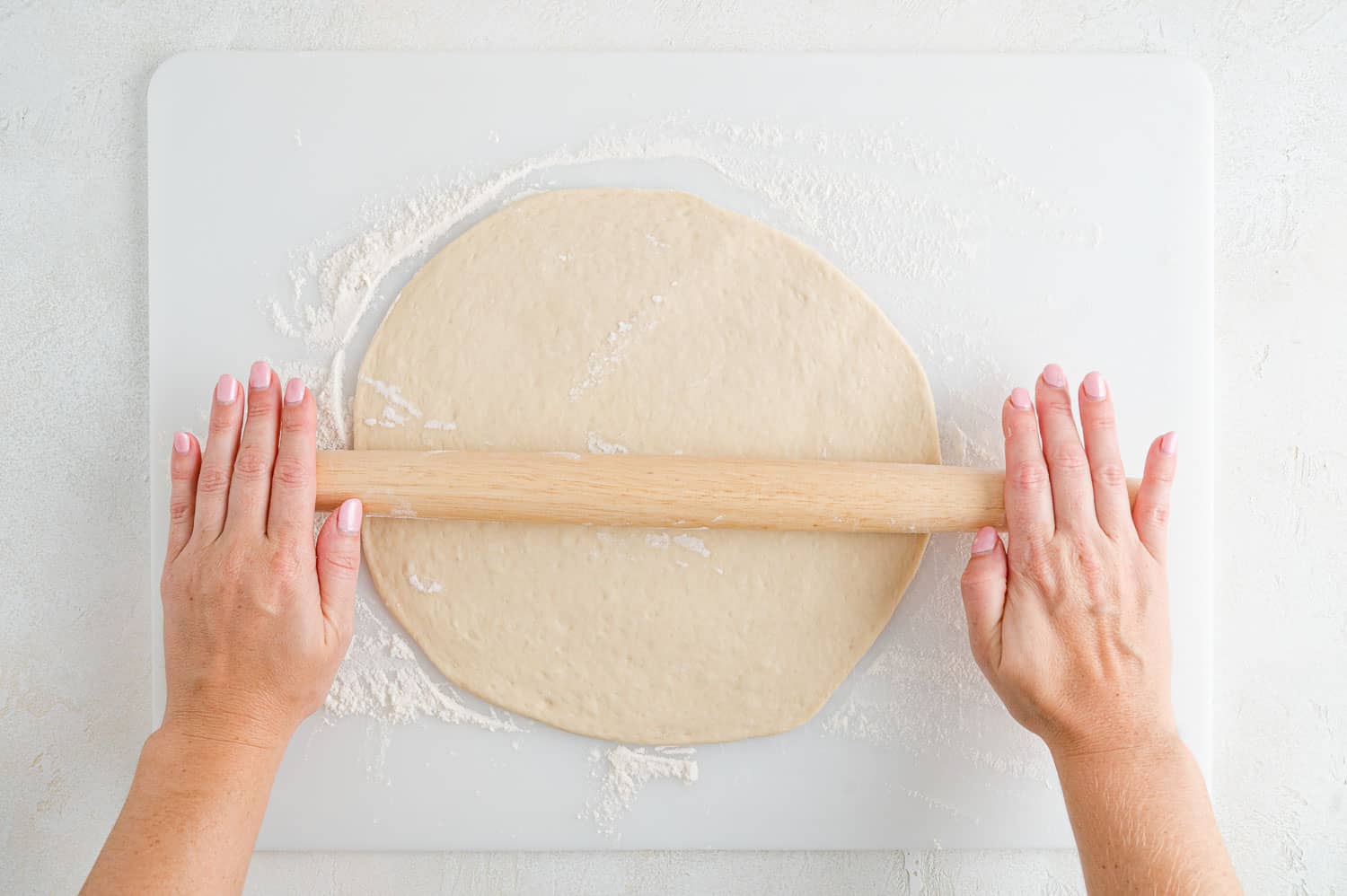 Dough being rolled out.