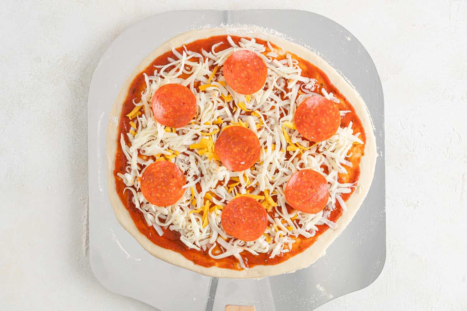 Unbaked pizza.
