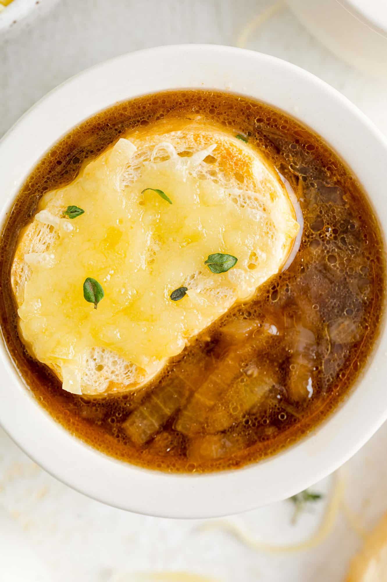 French onion soup topped with cheese topped bread.