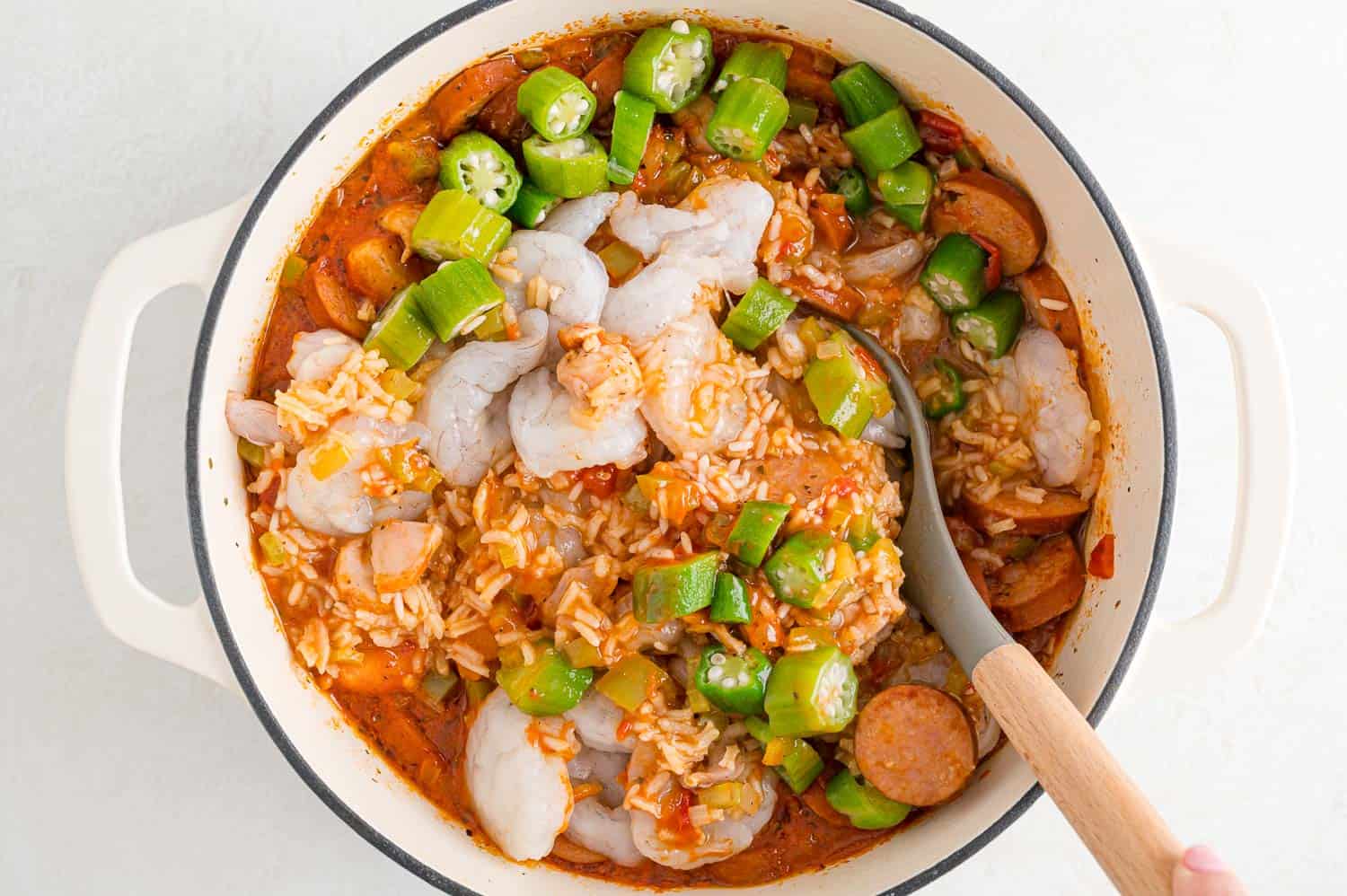 Shrimp and okra added to pan.