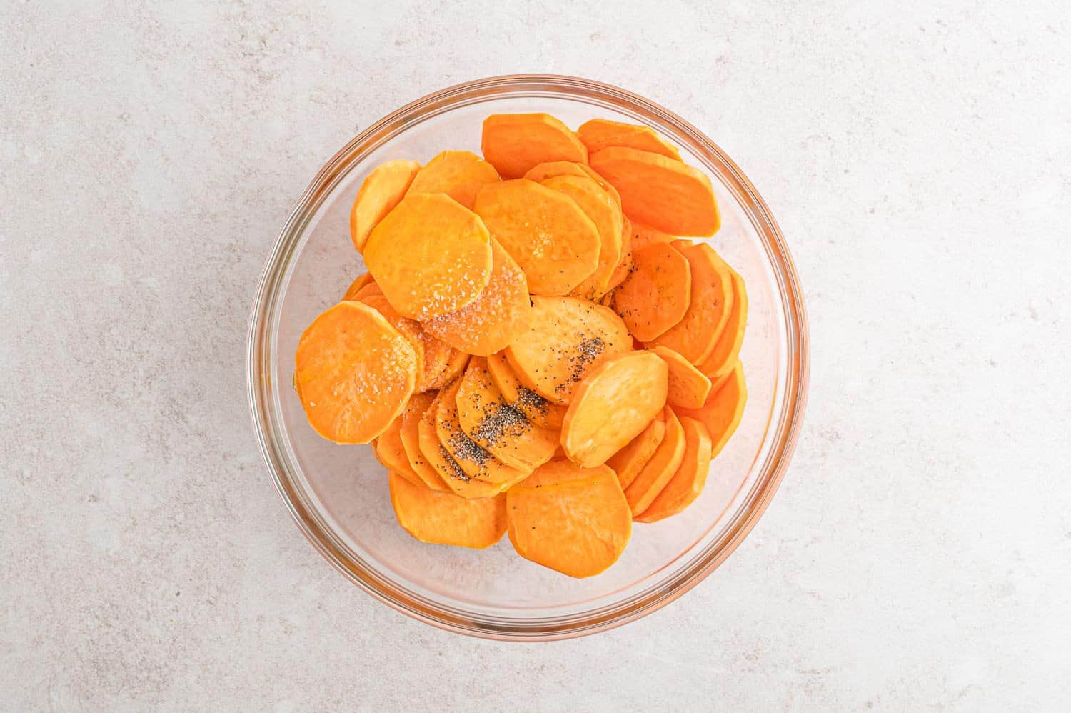 Sliced sweet potatoes in a bowl.