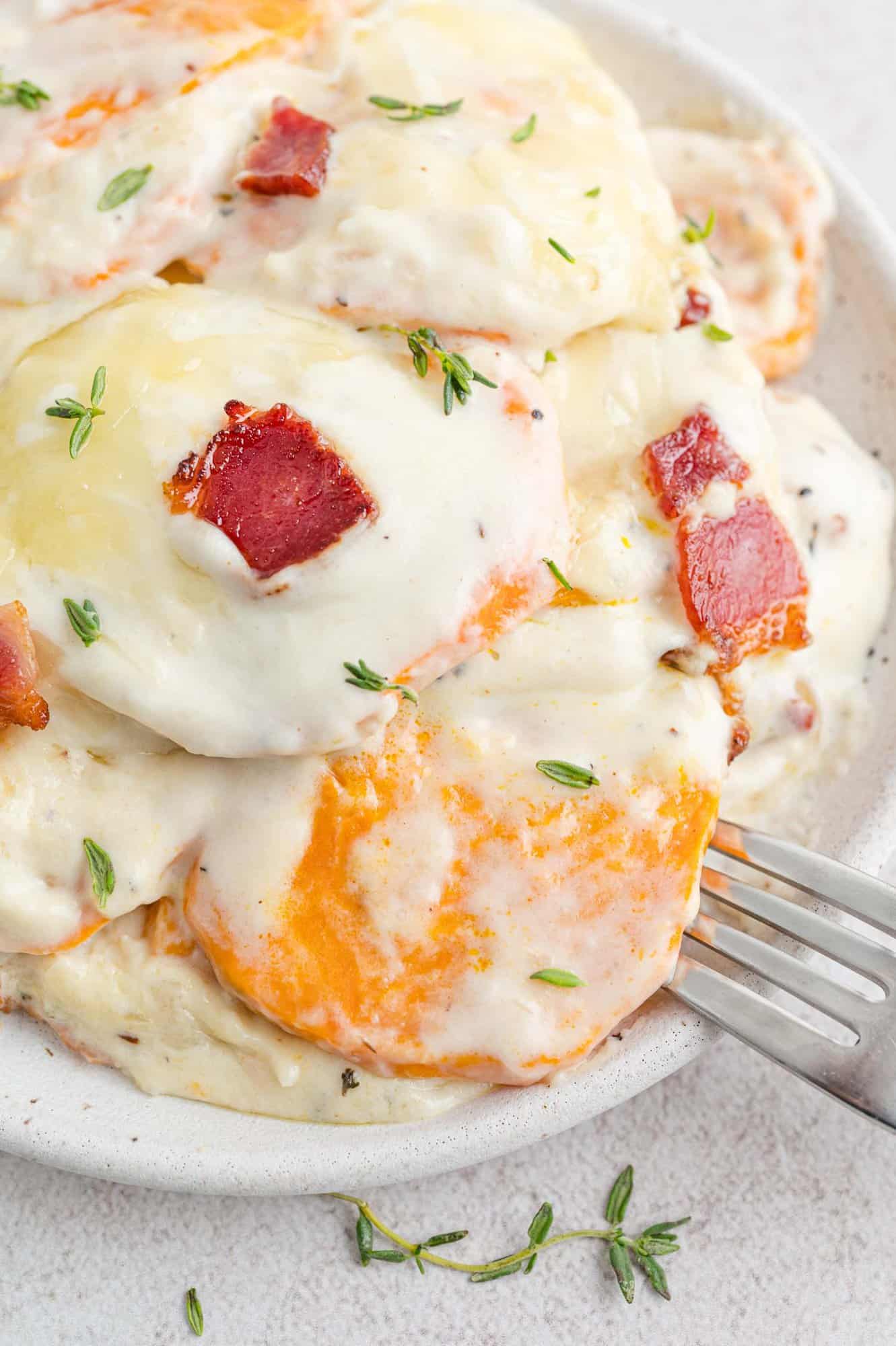 Sweet potatoes and a creamy white sauce with bacon.