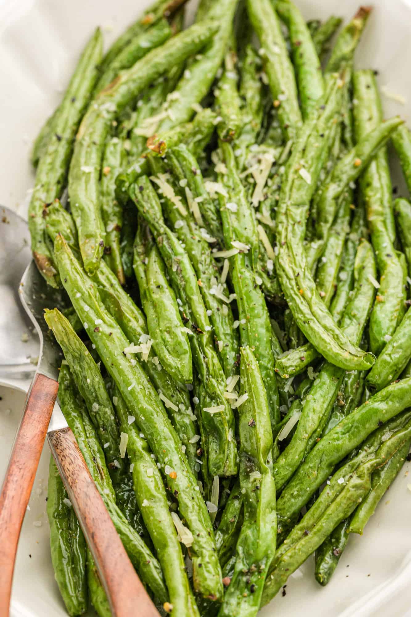 Air fryer green beans on a platter.