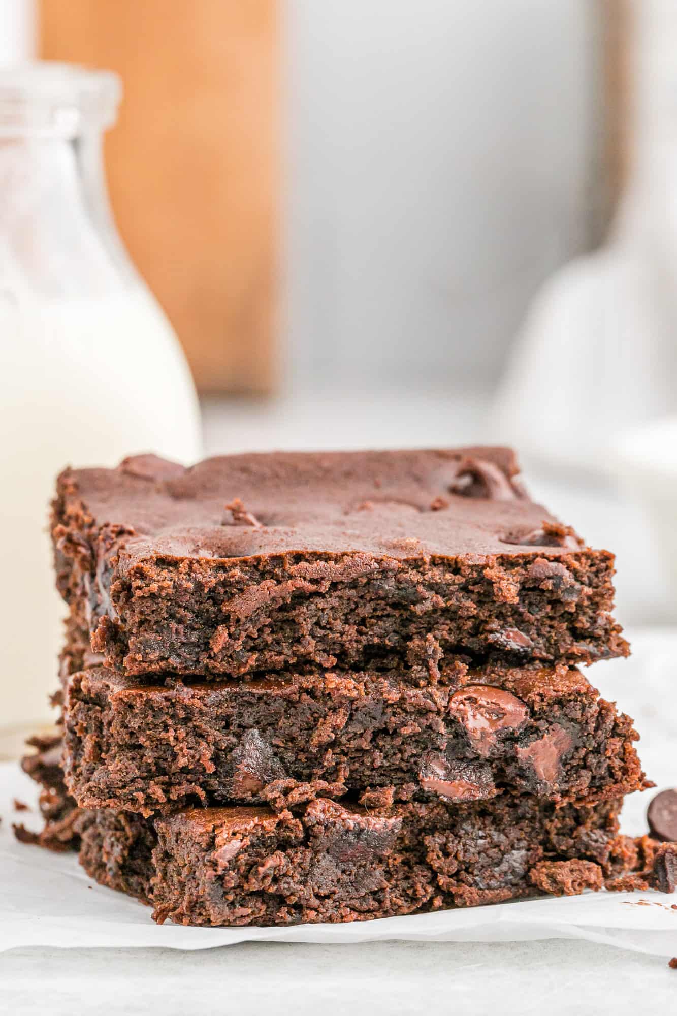 Three black bean brownies stacked up.