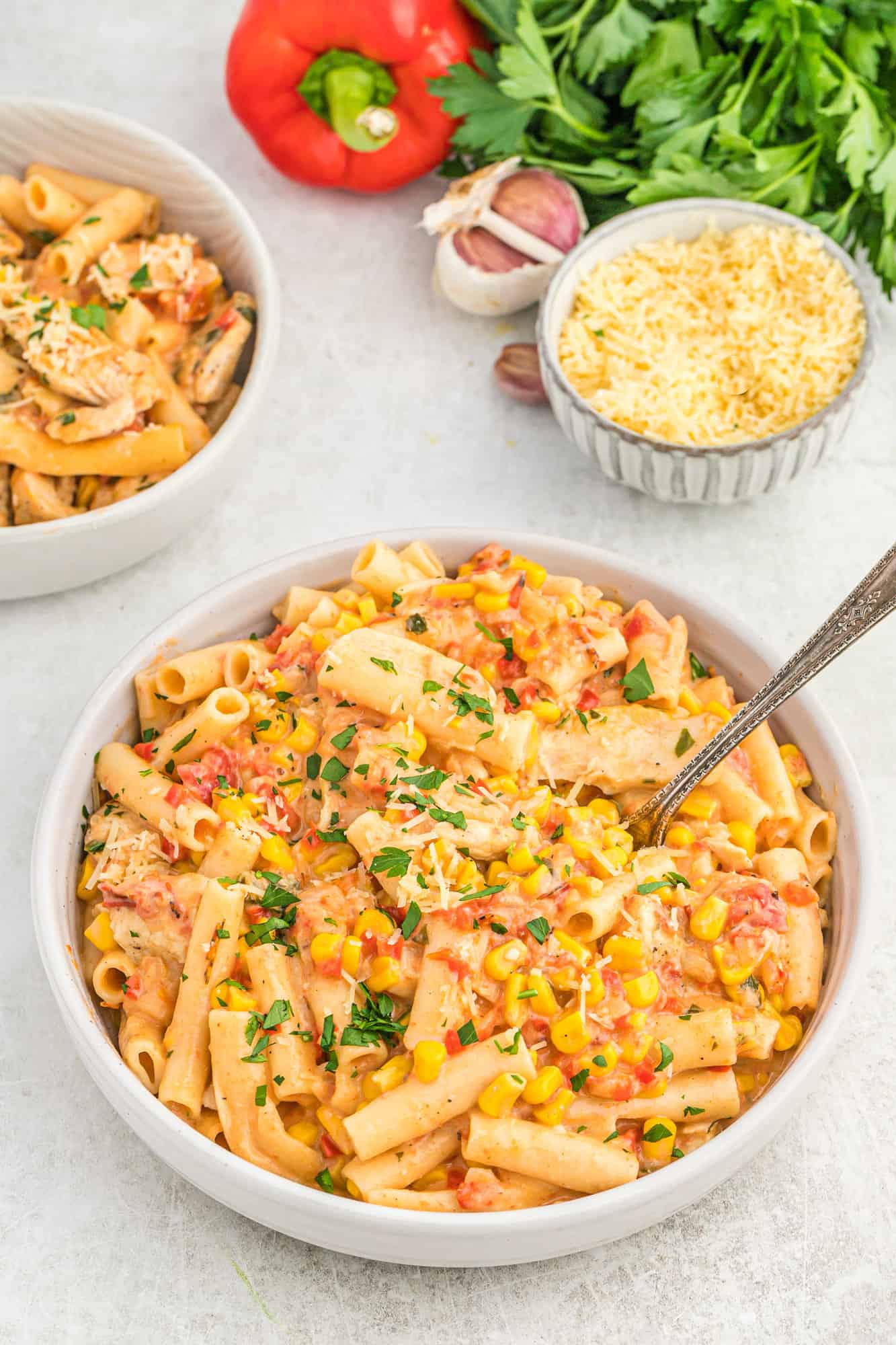 Pasta with chicken and vegetables in a large bowl.