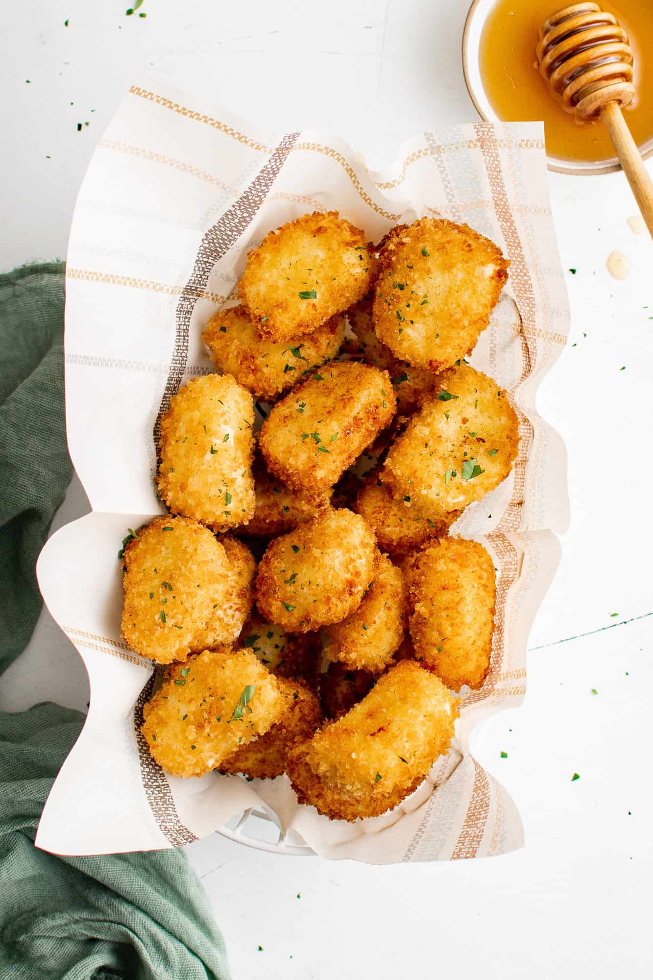 Fried goat cheese in a basket.