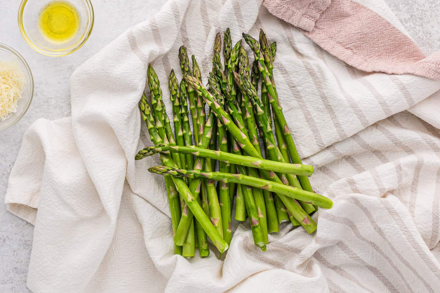 Washed asparagus, on a towel.