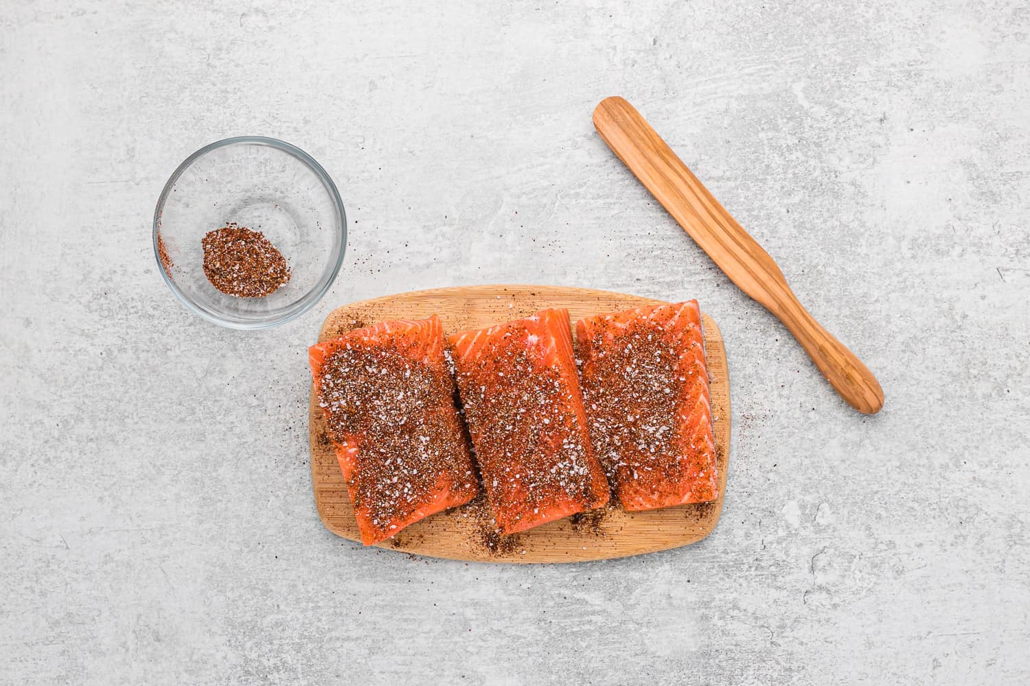 Salmon fillets with seasoning.