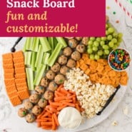 Colorful snacks, text overlay reads "fun and customizable snack board."