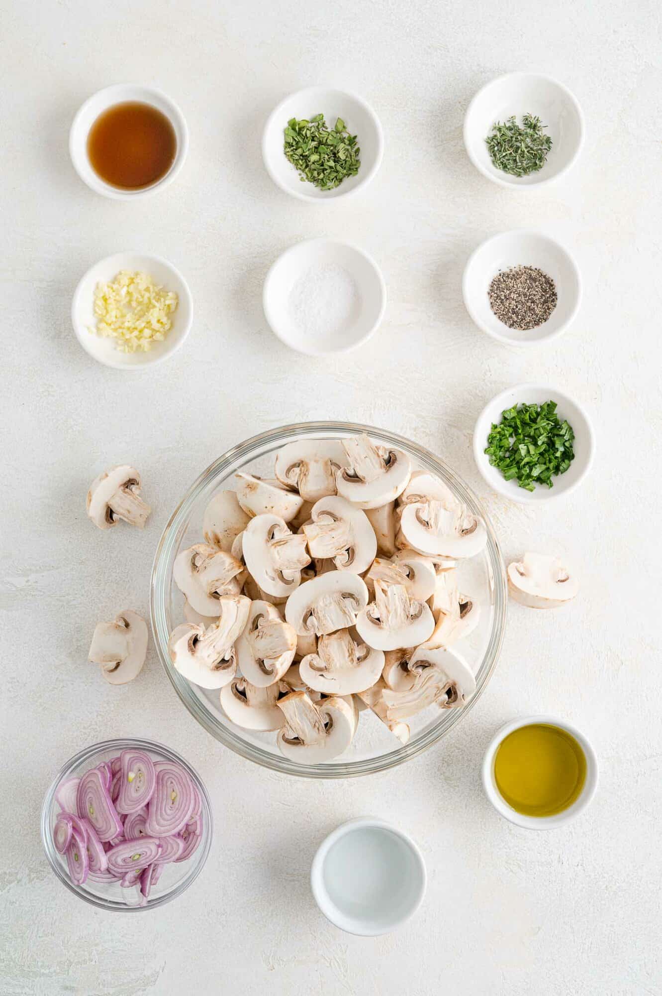 Ingredients needed for recipe, including fresh mushrooms.