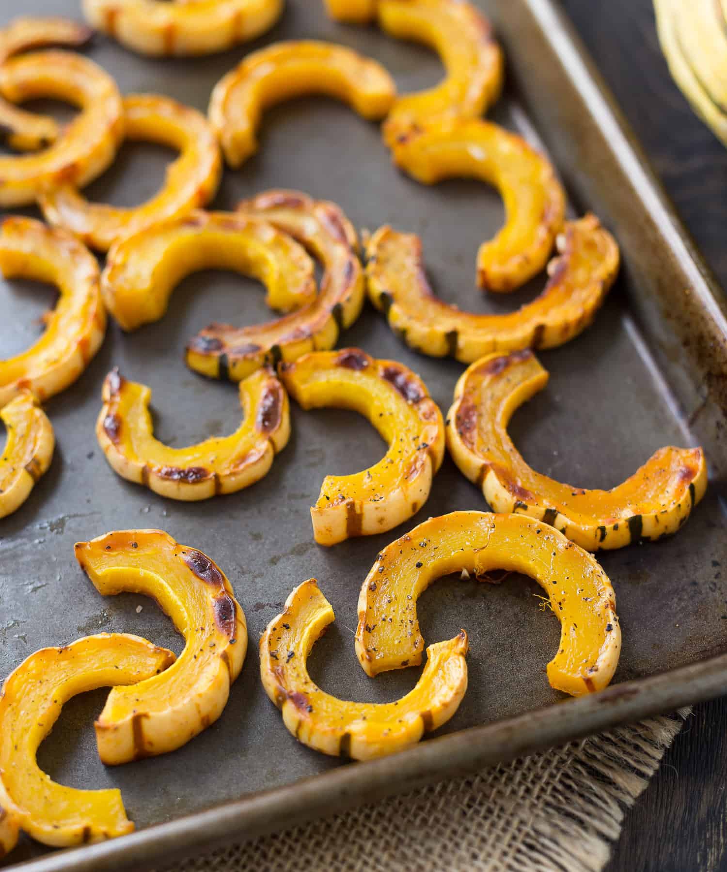 Roasted squash on a sheet pan.