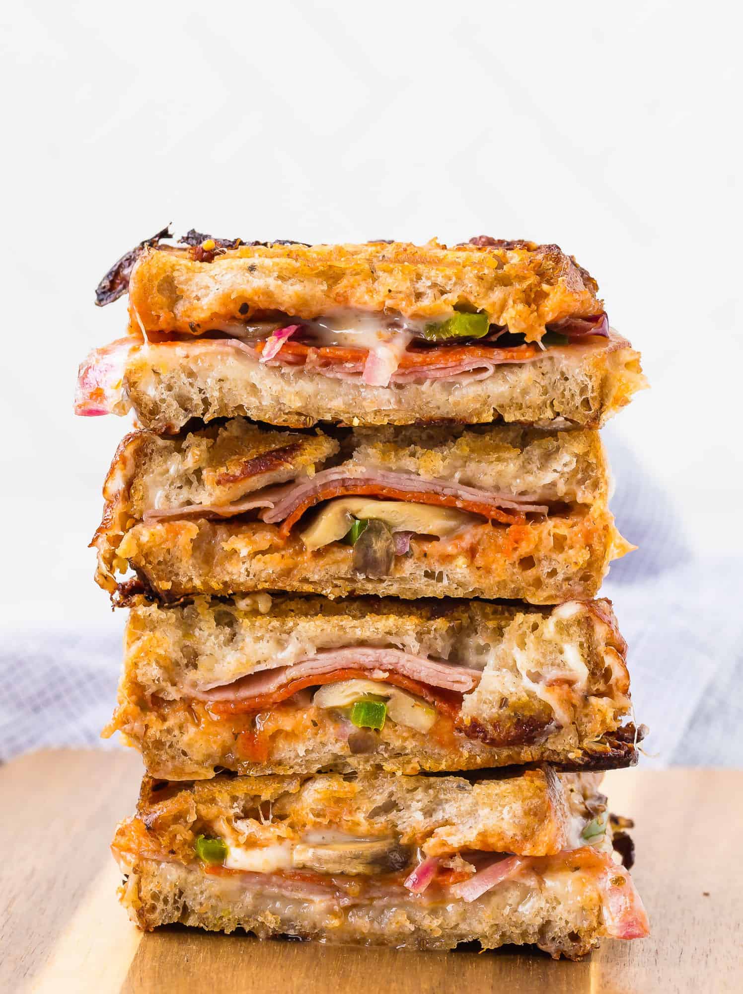 Grilled sandwiches with pizza fillings.