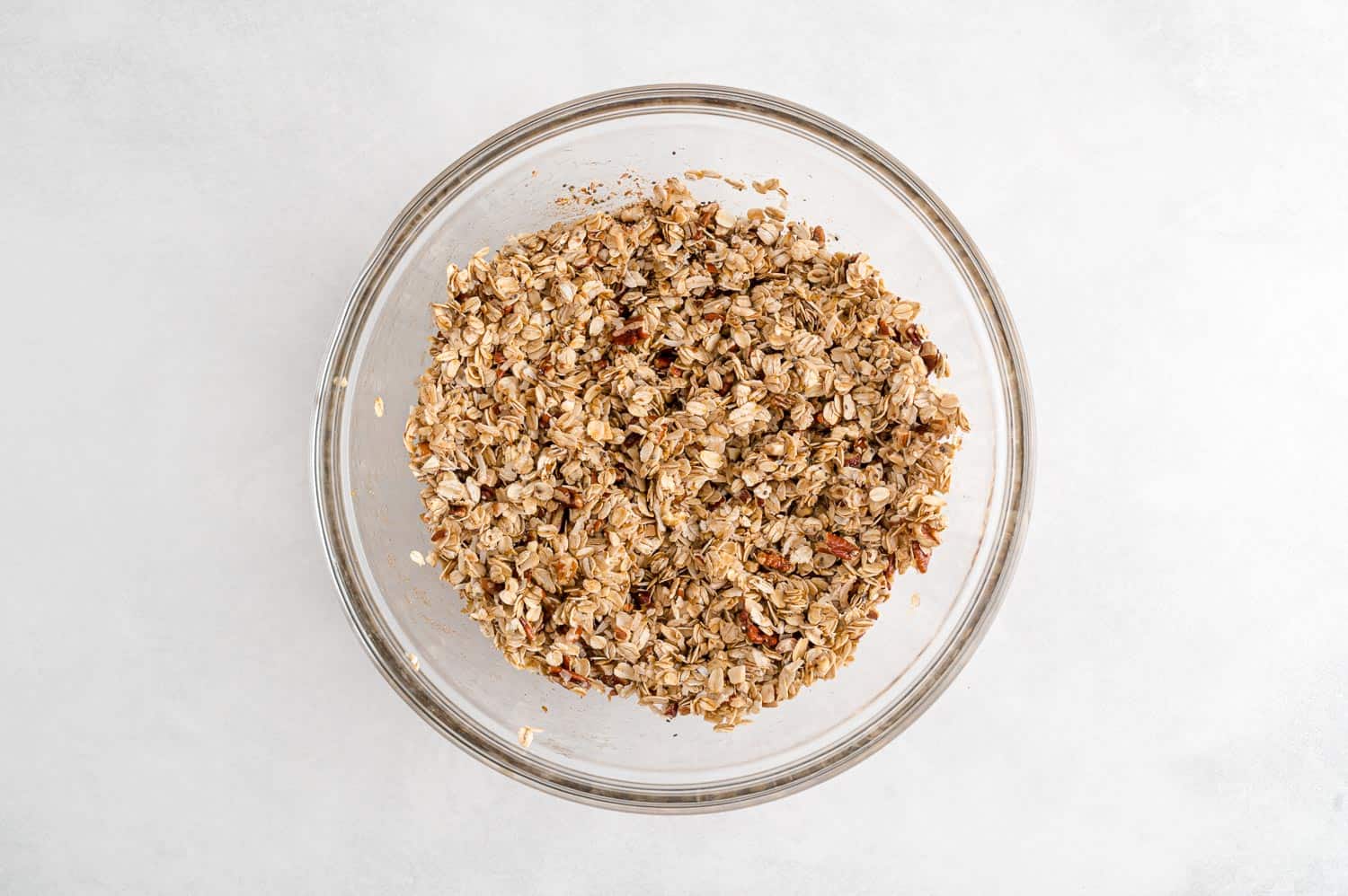 Unbaked granola in a bowl.